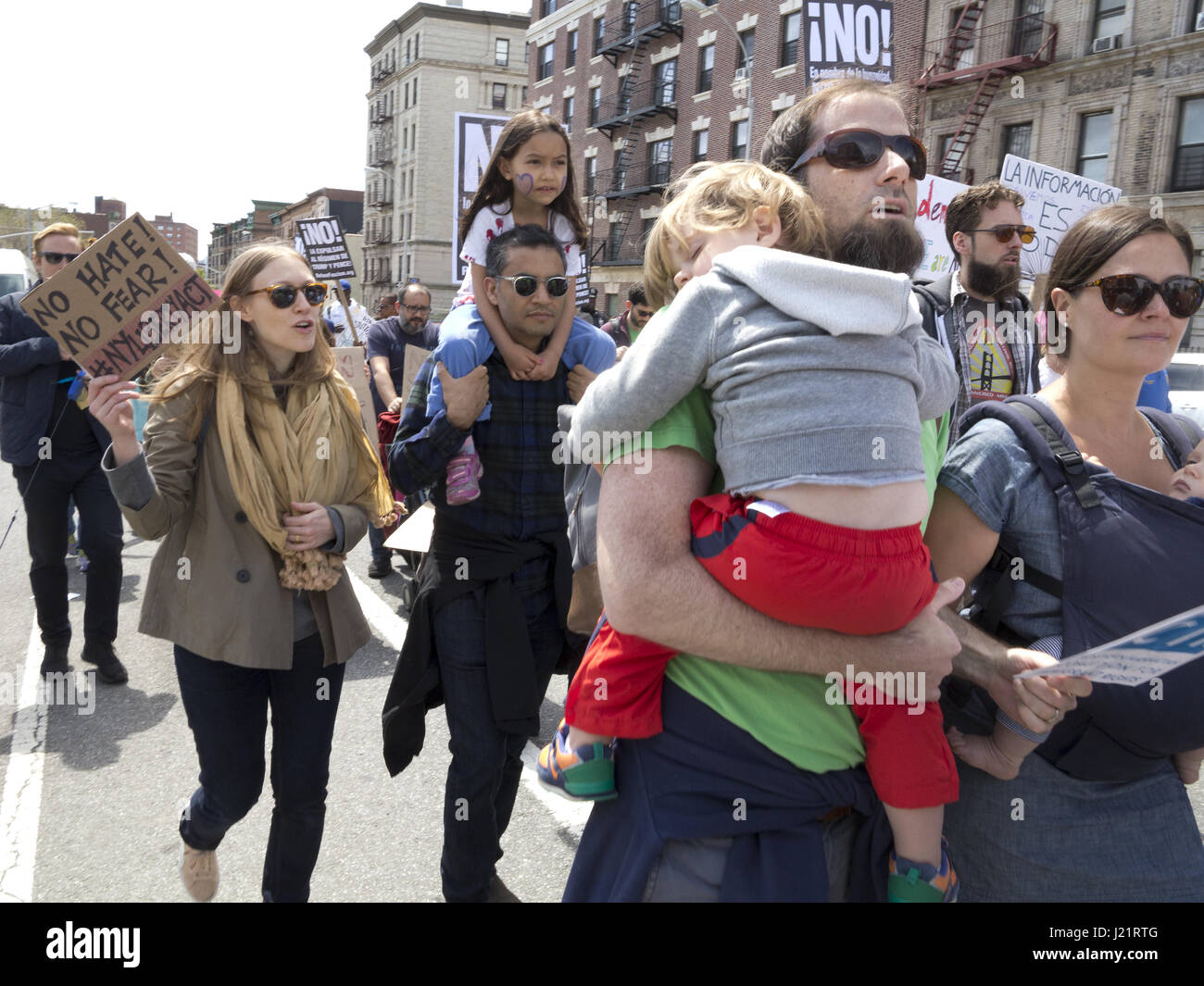 New York City NY, USA. 23rd Apr, 2017. Hundreds of protesters gathered in Harlem to rally and march from W.145th St. to Inwood in The Uptown March for Immigrants. Protesters demanded an end to detention and deportations, collaboration between ICE and local police, the separation of families, the Muslim ban, the wall, and the criminalization of immigrants. Credit: Ethel Wolvovitz/Alamy Live News Stock Photo