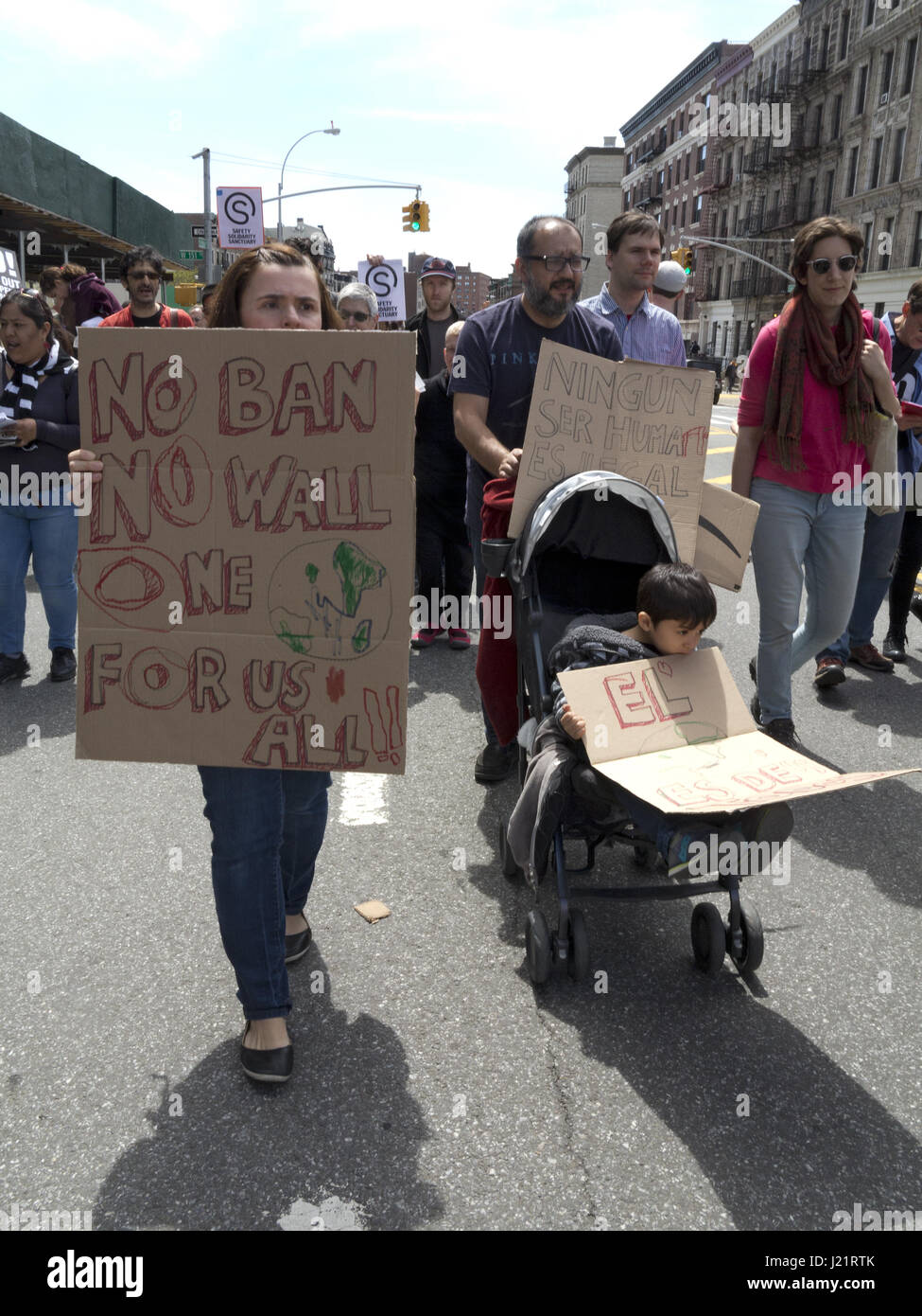 New York City NY, USA. 23rd Apr, 2017. Hundreds of protesters gathered in Harlem to rally and march from W.145th St. to Inwood in The Uptown March for Immigrants. Protesters demanded an end to detention and deportations, collaboration between ICE and local police, the separation of families, the Muslim ban, the wall, and the criminalization of immigrants. Credit: Ethel Wolvovitz/Alamy Live News Stock Photo