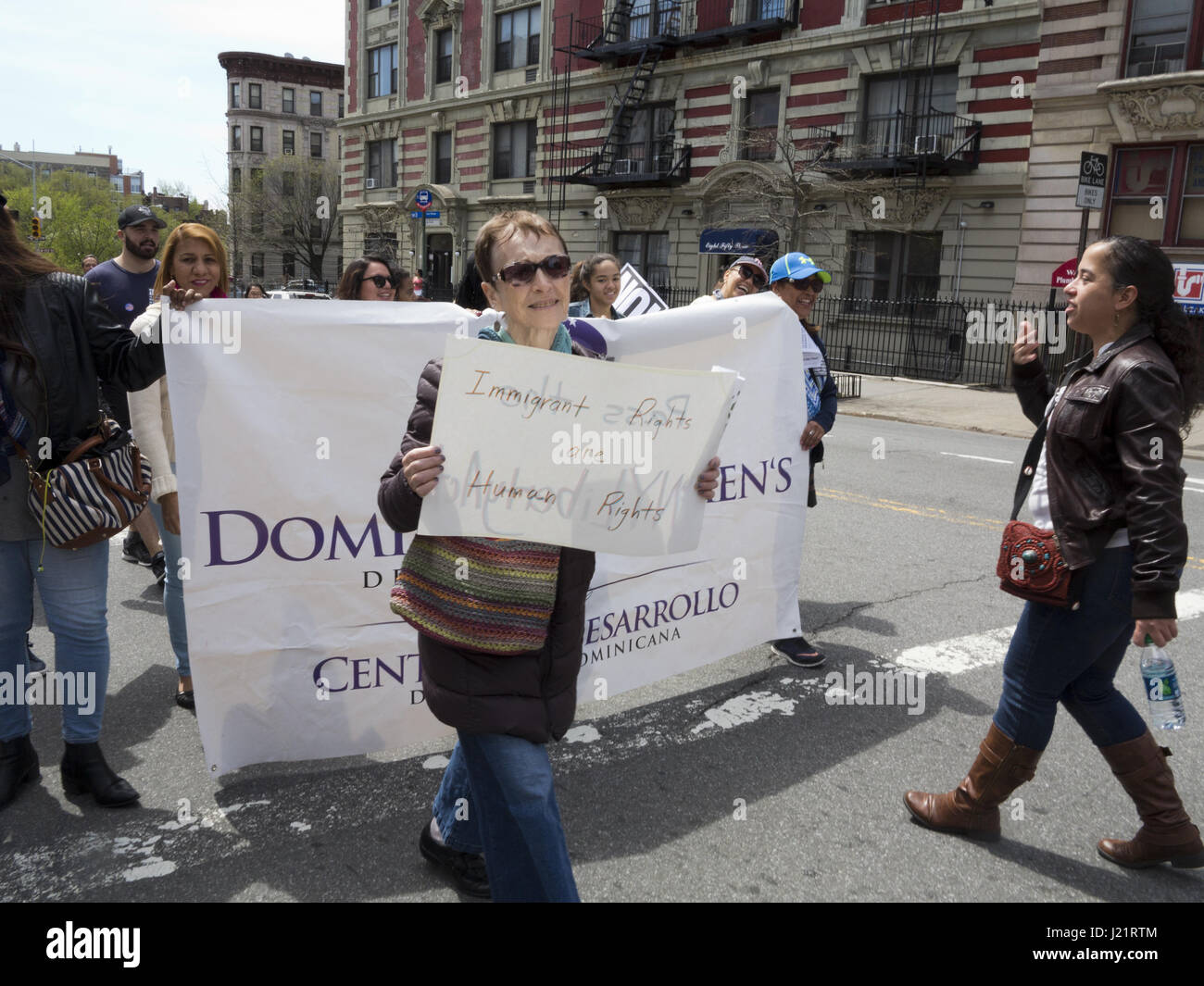 New York City NY, USA. 23rd Apr, 2017. Hundreds of protesters gathered in Harlem to rally and march from W.145th St. to Inwood in The Uptown March for Immigrants. Protesters demanded an end to detention and deportations, collaboration between ICE and local police, the separation of families, the Muslim ban, the wall, and the criminalization of immigrants. Credit: Ethel Wolvovitz/Alamy Live News Stock Photo