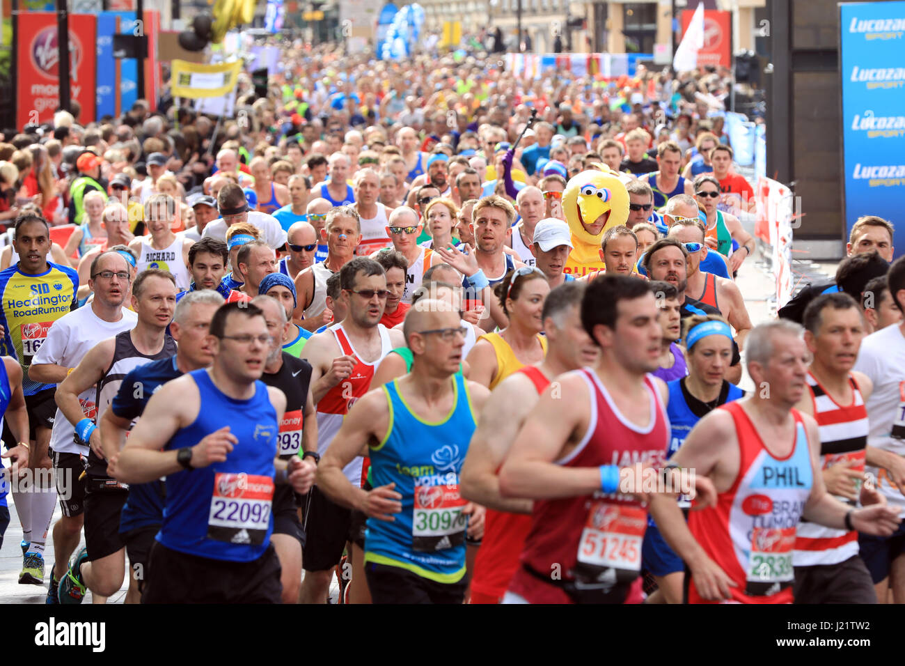 London, UK. 23rd April, 2017. Participants take part in the Virgin London Marathon 2017. Pictured passing Cutty Sark. Credit: Oliver Dixon/Alamy Live News Stock Photo