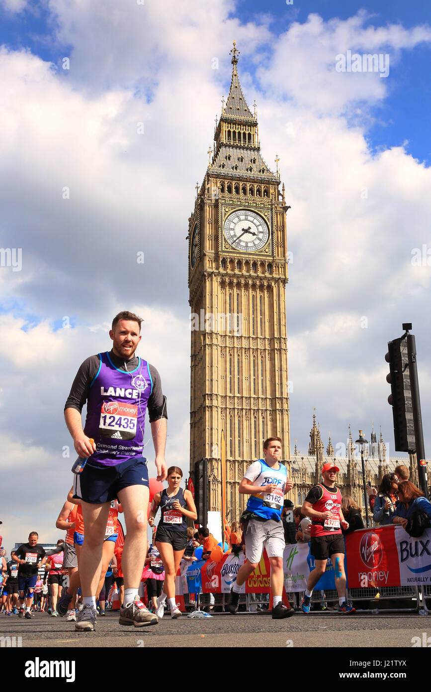 London, UK. 23rd April, 2017. Participants take part in the Virgin London Marathon 2017. Pictured in Westminster next to Parliament and Big Ben Credit: Oliver Dixon/Alamy Live News Stock Photo