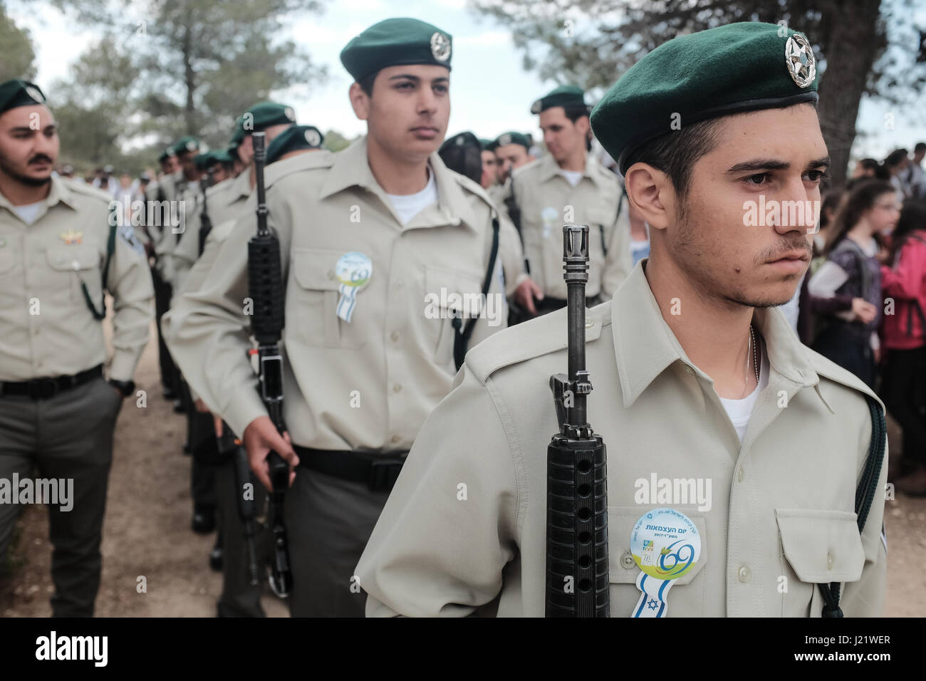 Kisalon, Israel. 24th April, 2017. A Border Police honor guard marches into an official ceremony on Holocaust Martyrs' and Heroes' Remembrance Day. The B’nai B’rith World Center and Keren Kayemeth LeIsrael (KKL-JNF) held a Holocaust commemoration ceremony on Yom Hashoah dedicated to commemorating the heroism of Jews who rescued fellow Jews during the years of torment in Europe in a forest planted with six million trees in 1951, a living monument of eternally green memorial candles Credit: Nir Alon/Alamy Live News Stock Photo