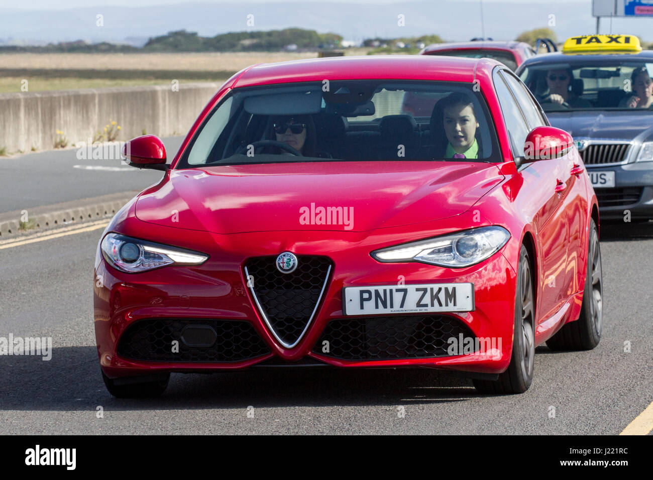 Alfa Romeo Giulia Speciale TD AutoVintage Festival and Classic Vehicle  Show, with cars driving down the resort seafront and promenade, Southport,  UK Stock Photo - Alamy