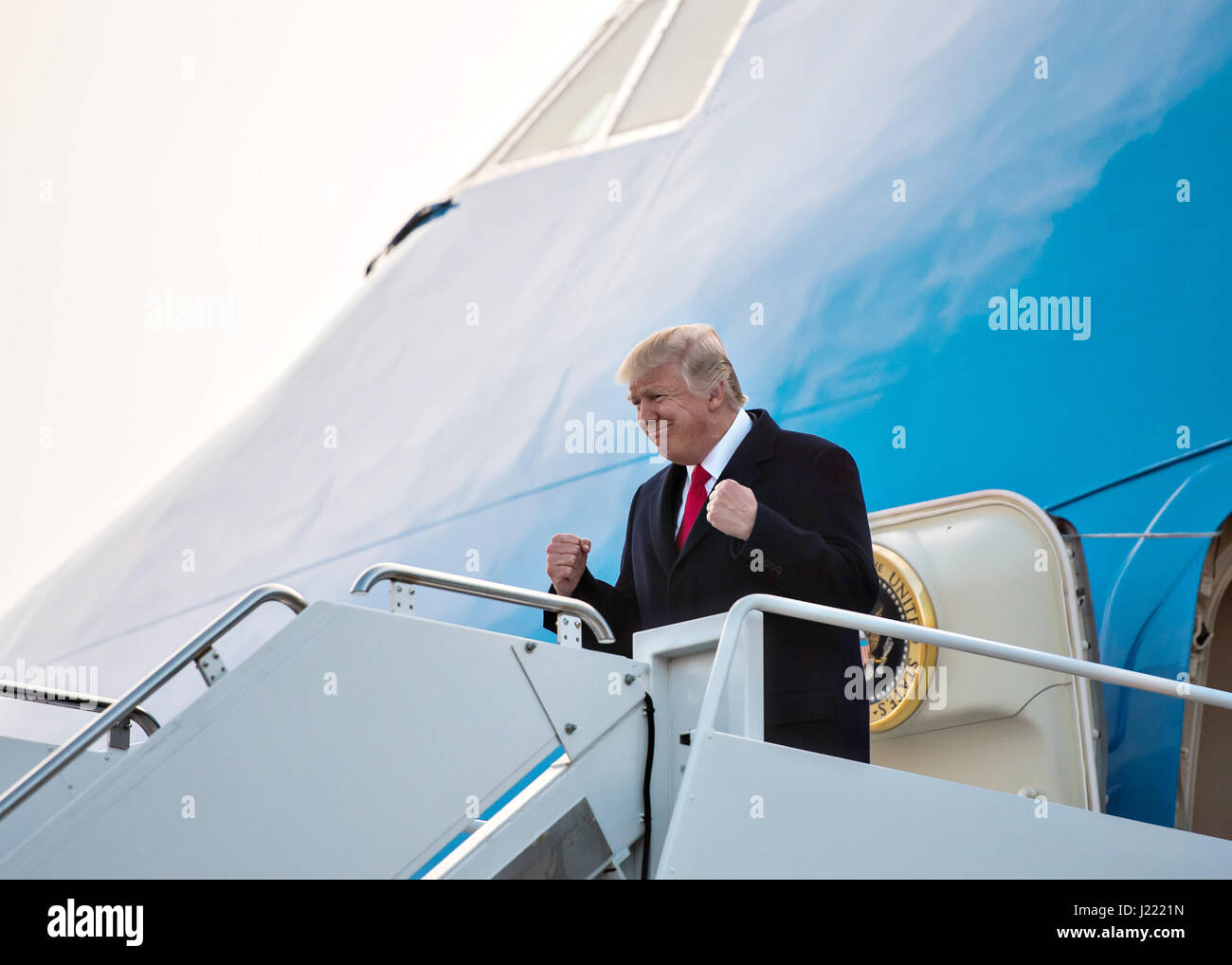 U.S. President Donald Trump gestures after stepping off Air Force One at the Kentucky Air National Guard Base March 20, 2017 in Louisville, Kentucky. Trump is in Louisville to attend a rally at the Kentucky Exposition Center. Stock Photo
