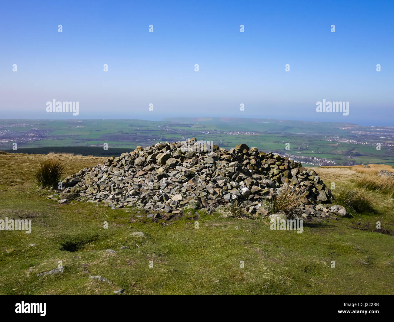 The large Cairn at the summit of Dent Fell, the first fell on the coast to coast walking route, Cumbria, Uk Stock Photo
