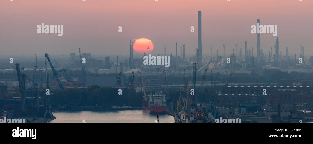 Aerial panorama Rotterdam port at sunset. Rotterdam, South Holland, Netherlands. Stock Photo