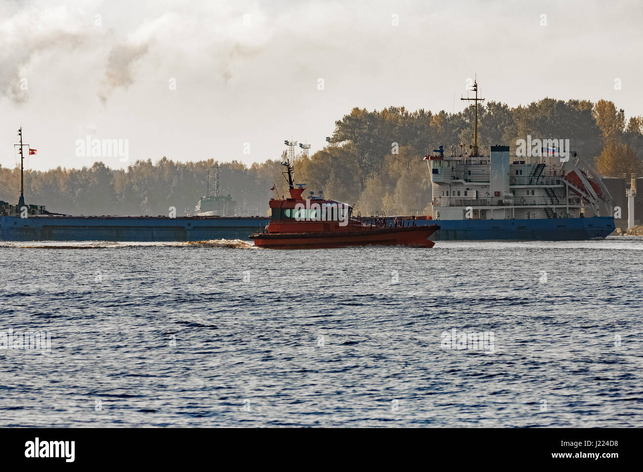 Blue cargo ship entering the port of Riga, Europe Stock Photo - Alamy