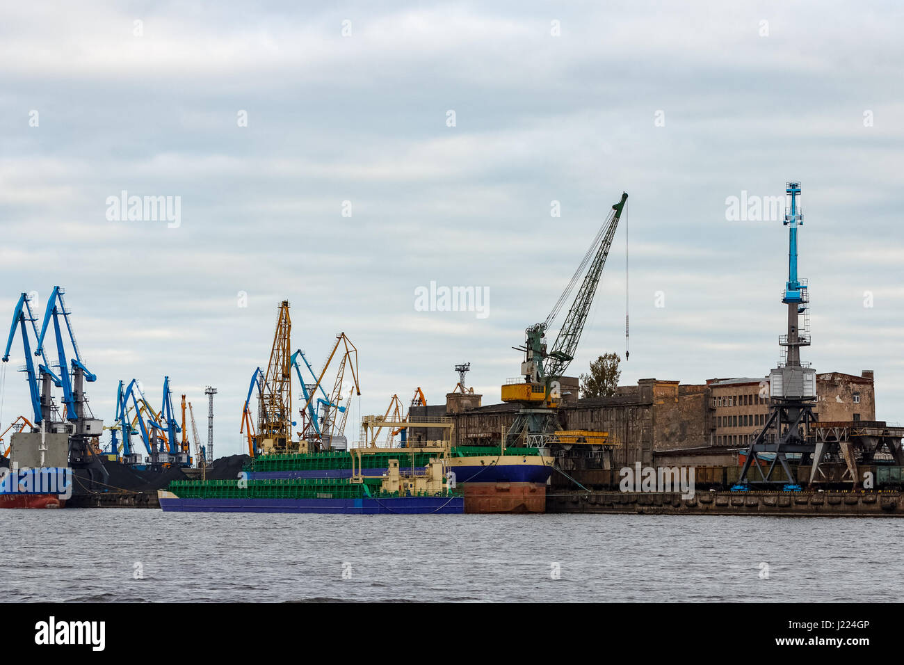 Blue cargo ship in the port of Riga, Europe Stock Photo - Alamy