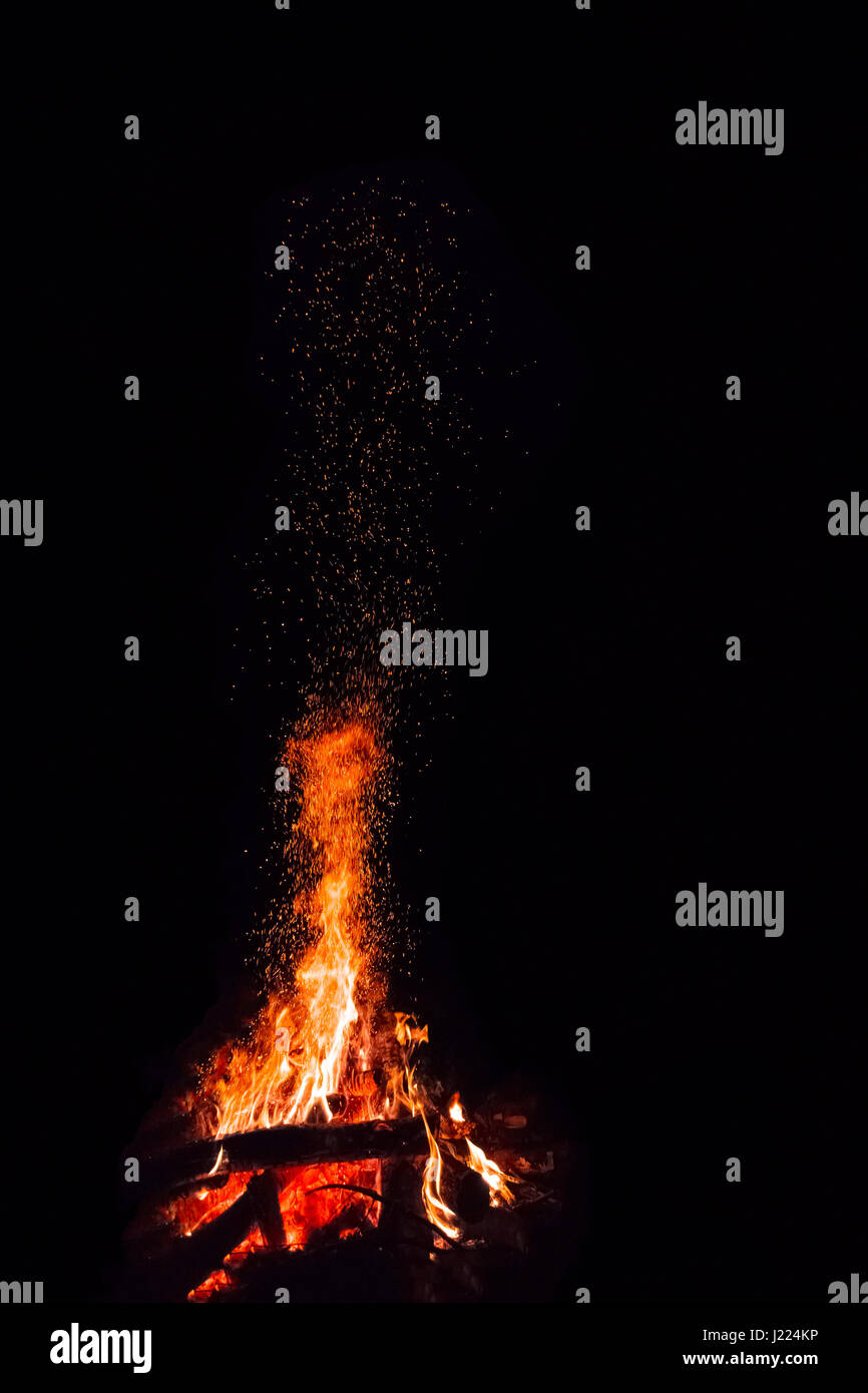 Campfire with flying sparks isolated on black background Stock Photo ...