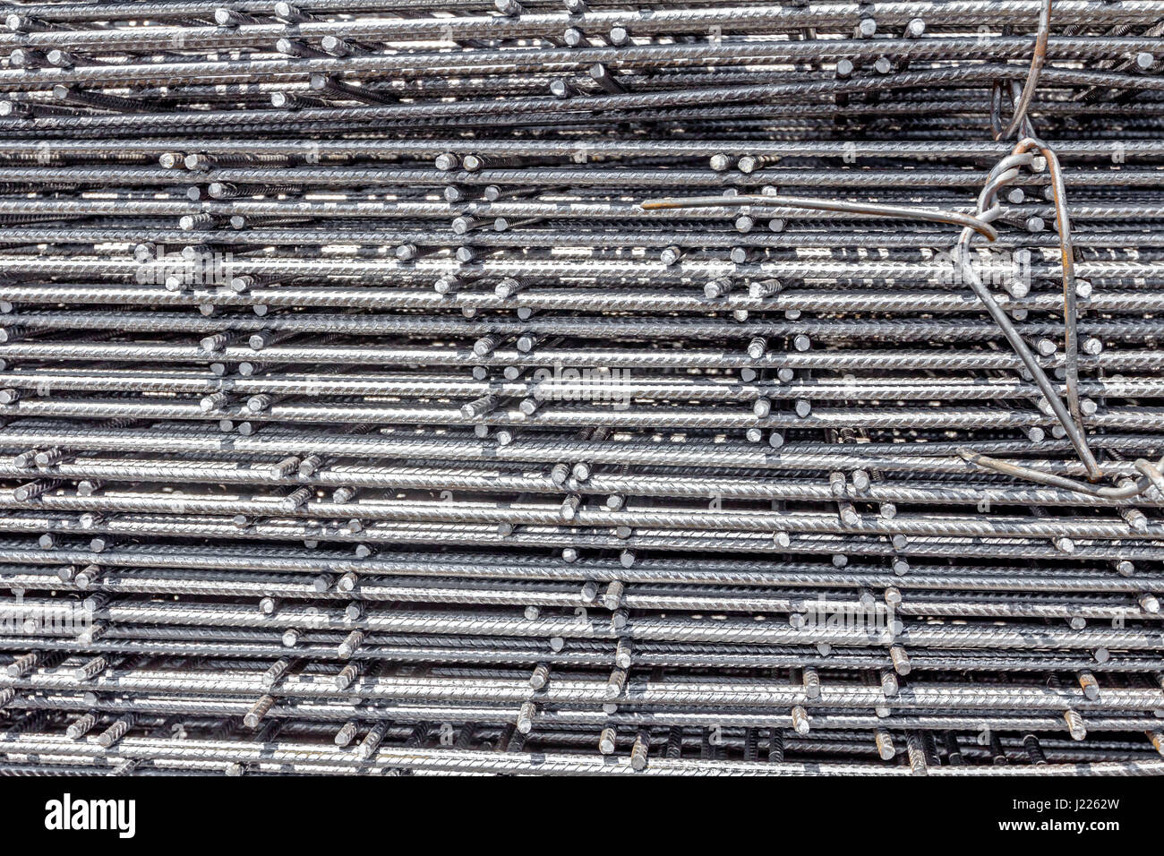 Spikes of rebar grid, reinforcing mesh, steel bars stacked for construction Stock Photo Alamy
