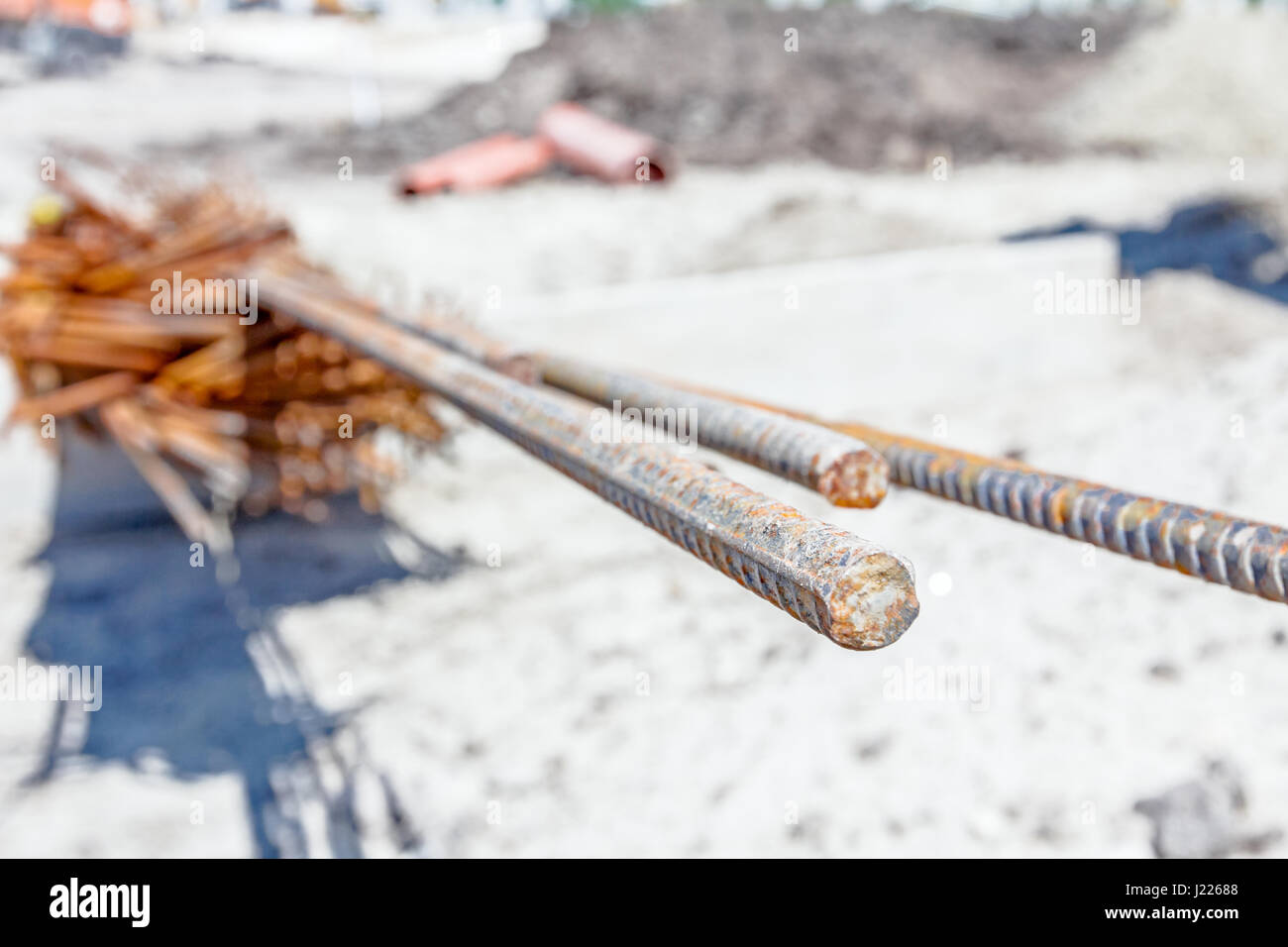 Spikes of rebar reinforcing steel bars stacked for construction. Selected according to shape are