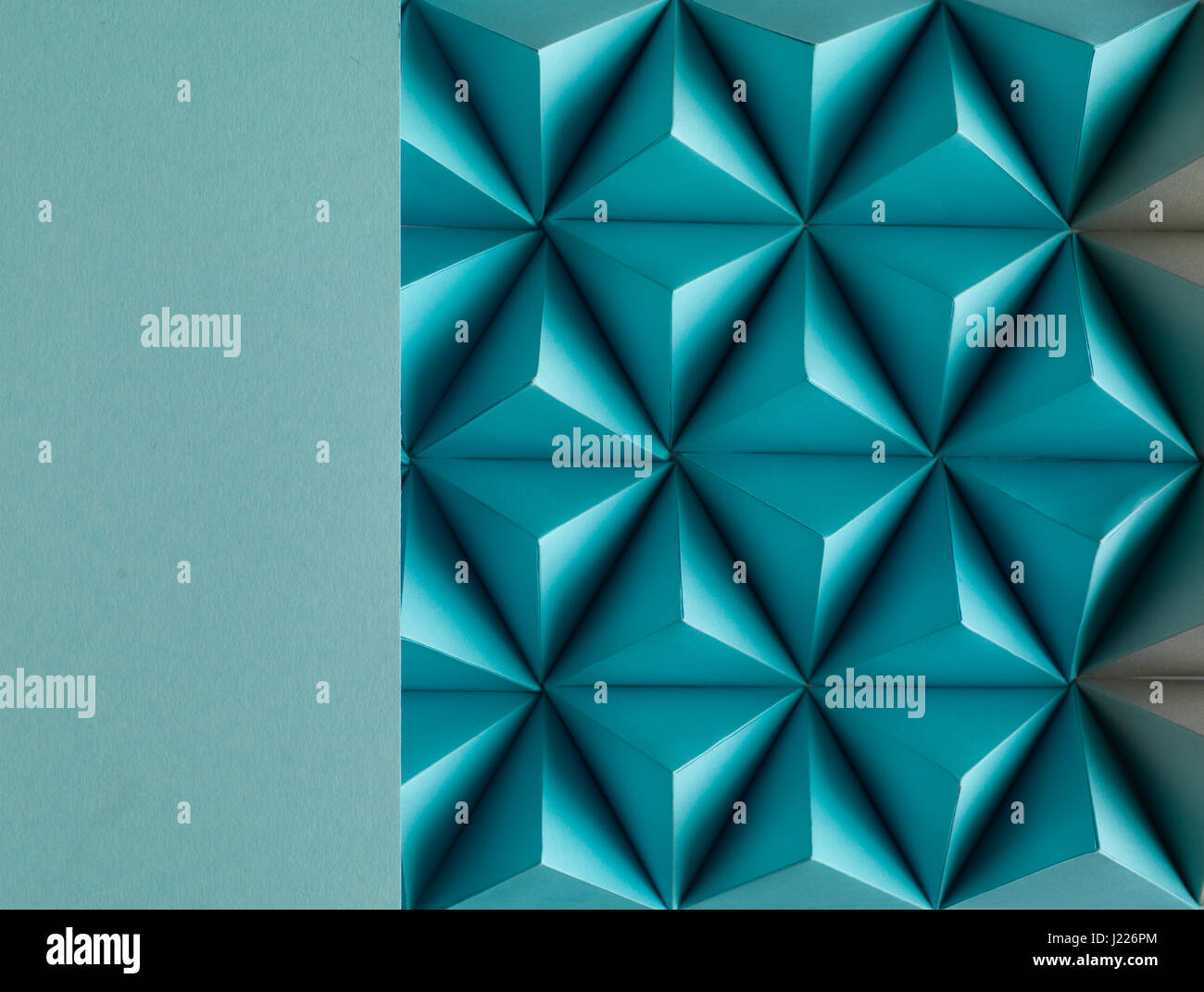 Abstract blue paper poly  made from  tetrahedron background. Usefull for business cards and web. Stock Photo