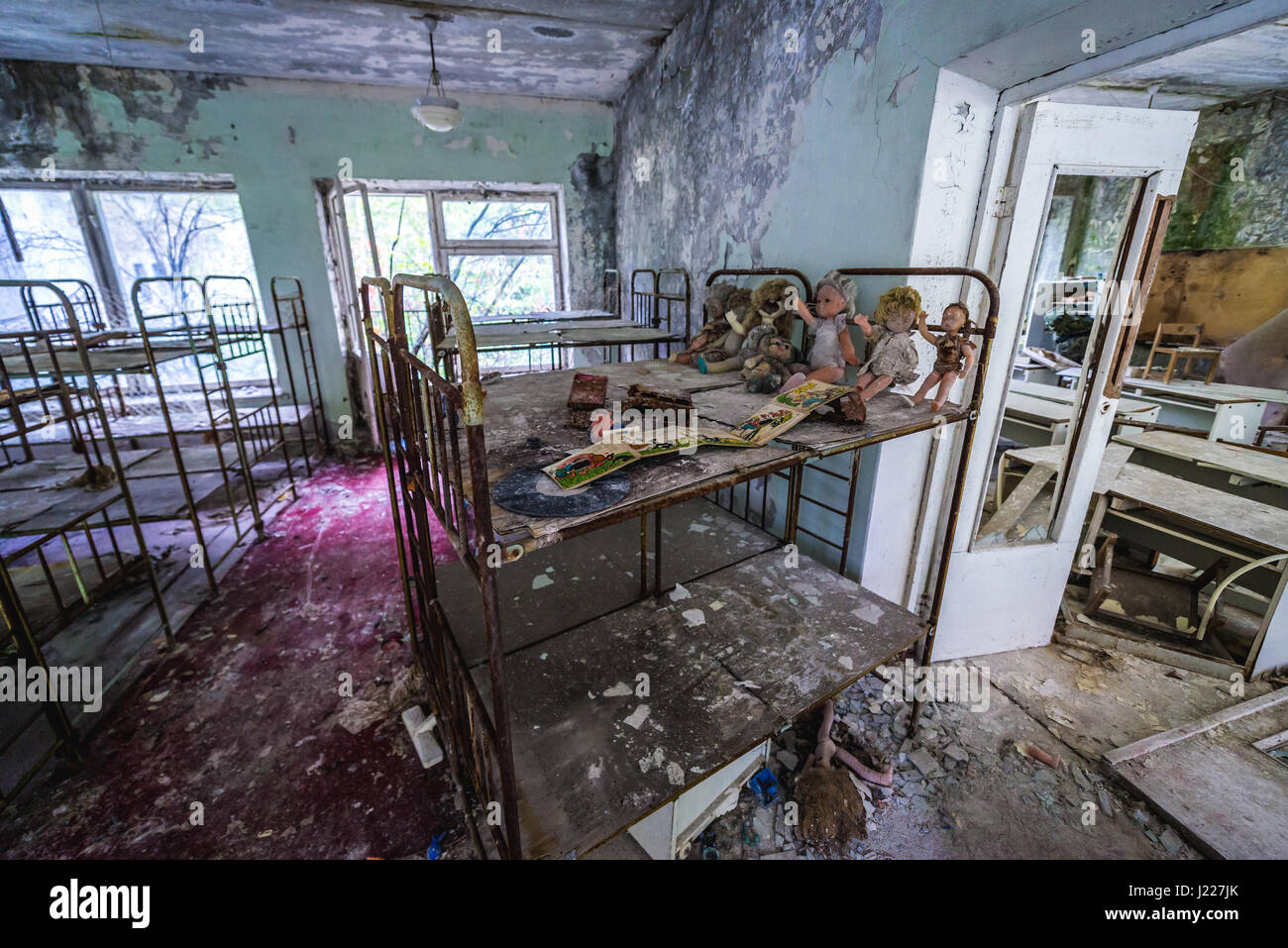 Toys in 'Cheburashka' kindergarten No 10 in Pripyat ghost city, Chernobyl Nuclear Power Plant Zone of Alienation in Ukraine Stock Photo