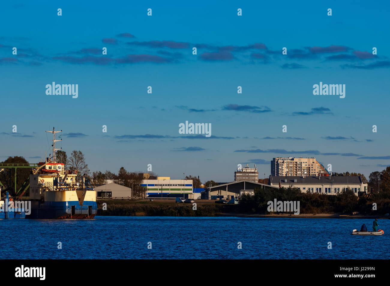 Blue cargo ship in the port of Riga, Europe Stock Photo - Alamy