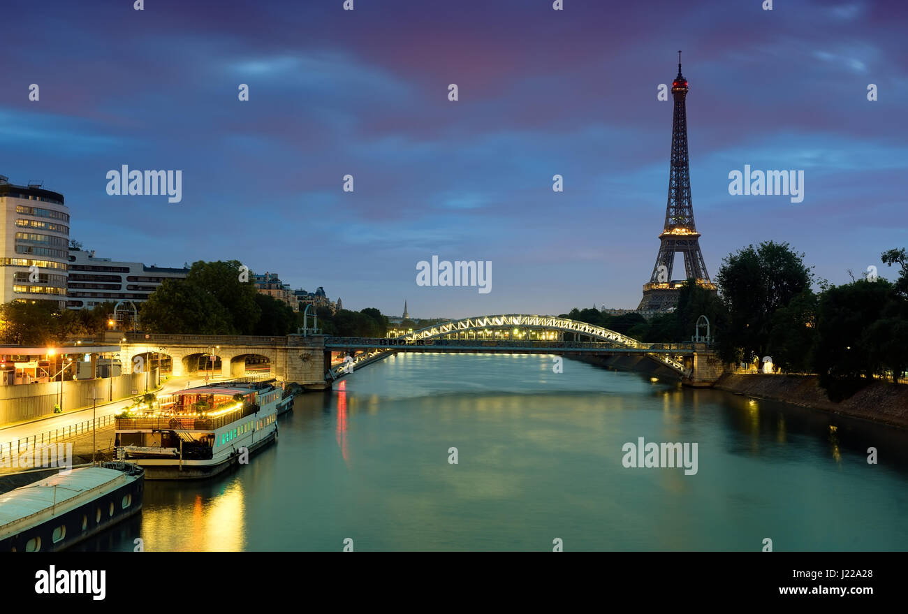 Cityscape of Paris with the view on Eiffel Tower and Pont Rouelle in early morning, France Stock Photo