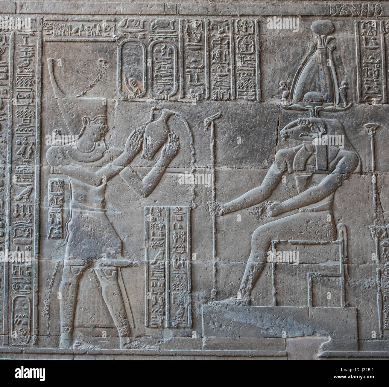 Hieroglypic carvings on wall at the ancient egyptian temple of Khnum in Esna Stock Photo