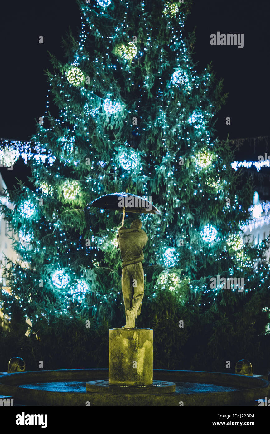 The ,,kissing students'' fountain and christmas tree in tartu town hall Stock Photo