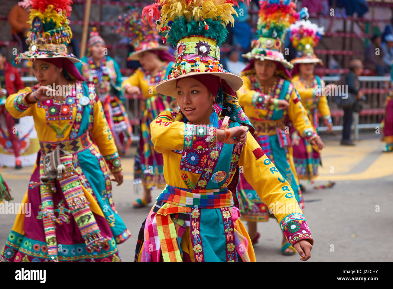 Tinkus dancers in colourful costumes performing at the annual Oruro Carnival. The event is designated by UNESCO as being Intangible Cultural Heritage Stock Photo