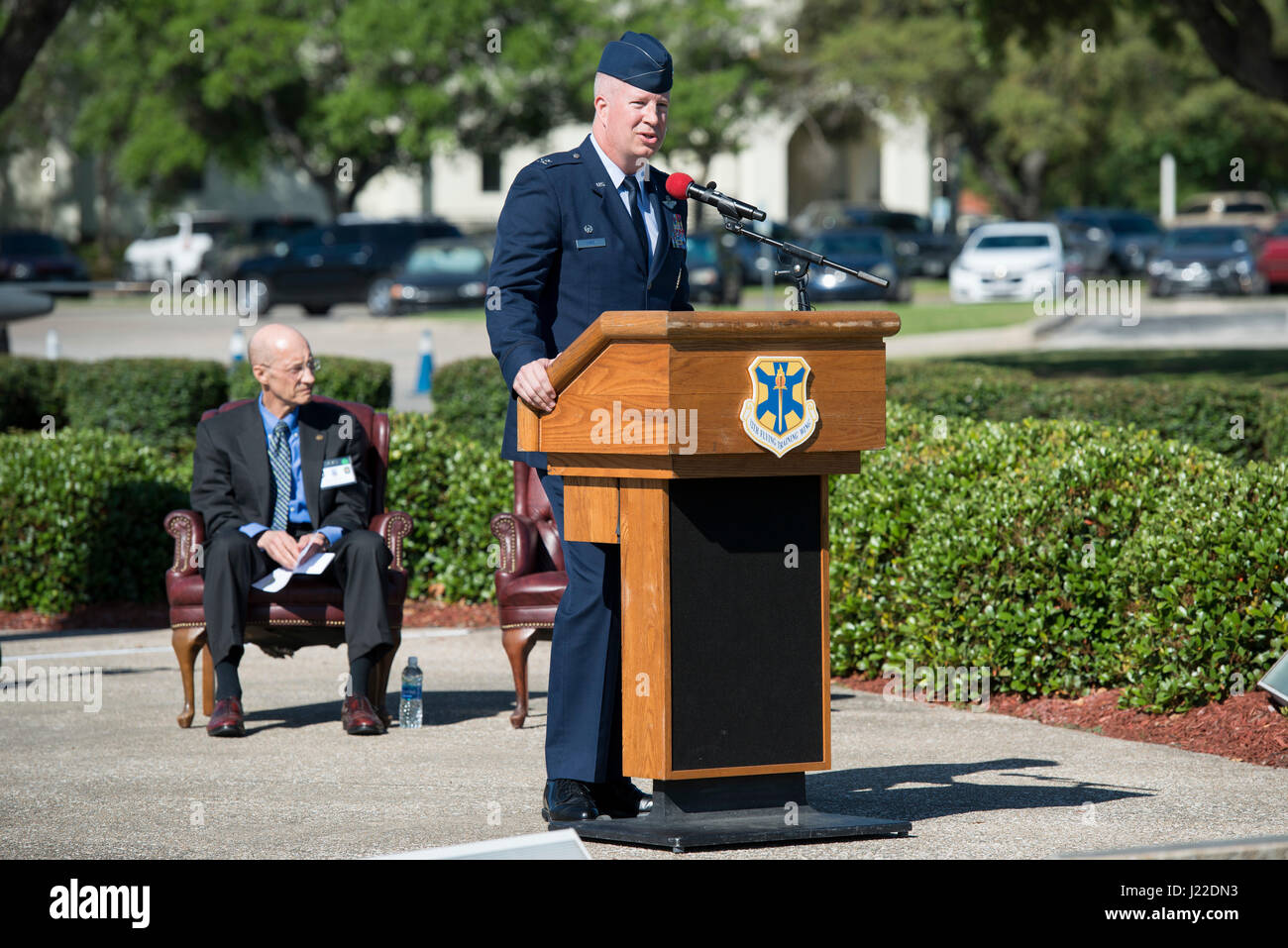 Col. Joel Carey, 12th Flying Training Wing commander, speaks during the Freedom Flyer Reunion wreath laying ceremony March 31, 2017, at Joint Base San Antonio-Randolph, Texas. The event honors all prisoners of war and missing in action service members from the Vietnam War and included a wreath-laying ceremony and a missing man formation flyover.  (U.S. Air Force photo by Sean M. Worrell) Stock Photo