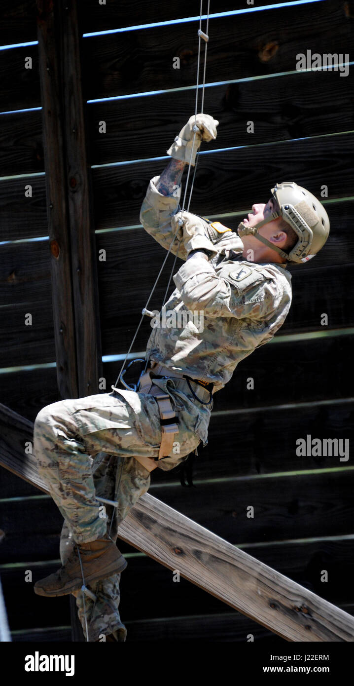 Army Ranger Ladder Man Staff Sgt. Luke Katz climbs a ladder leading up to a tower during the ...