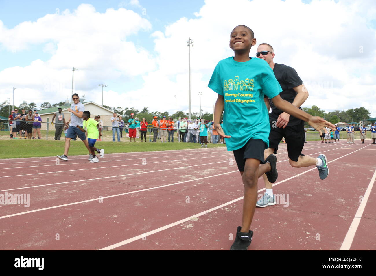 A boy runs in a track competition during this year’s Liberty County