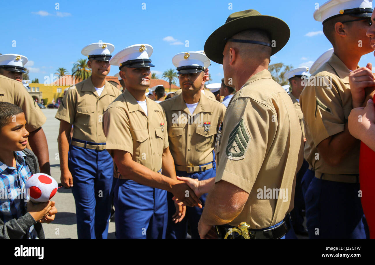 Marines from Golf Company, 2nd Recruit Training Battalion, march as a company for the last time on graduation day at Marine Corps Recruit Depot San Diego, today.   Graduation takes place at the completion of a 13-week transformation including training in drill, marksmanship, basic combat skills and Marine Corps customs and traditions. Annually, more than 17,000 males recruited from the Western Recruiting Region are trained at MCRD San Diego. Stock Photo
