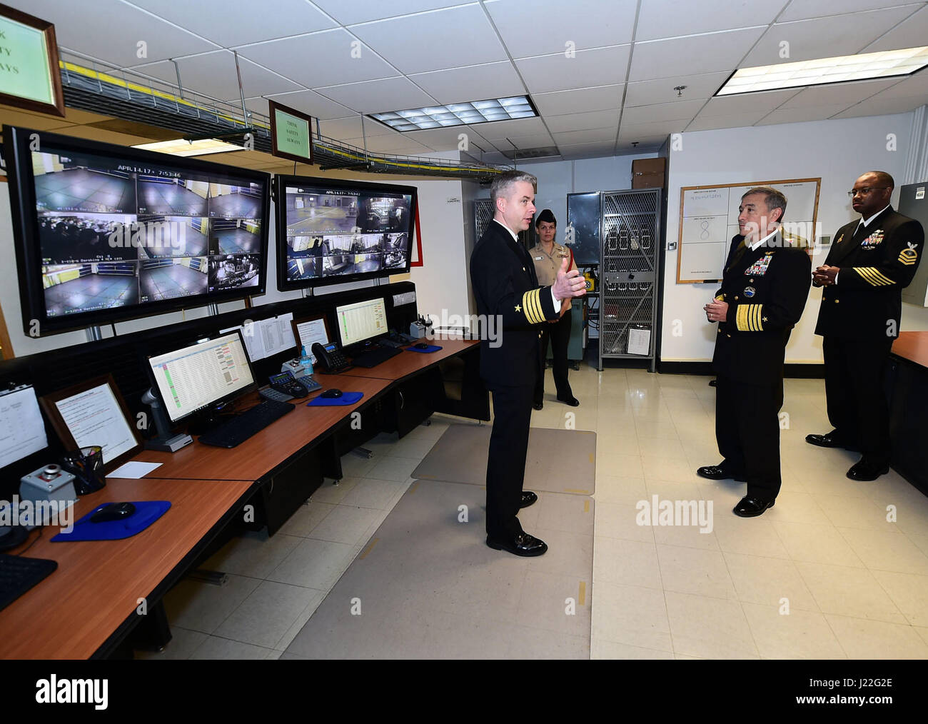 170414-N-IK959-308  GREAT LAKES, Ill. (April 14, 2017) Capt. Michael S. Garrick, commanding officer at Recruit Training Command, conducts a tour of the master control room of the U. S. Navy’s largest simulator, USS Trayer (BST 21), to Adm. Harry B. Harris, commander, U. S. Pacific Command, center. Trayer is a 210-foot-long Arleigh Burke-class destroyer simulator for recruits to train on Battle Stations, a 12-hour culmination of basic training and the last evolution recruits complete before they graduate. Harris also was the reviewing officer at the weekly pass-in-review recruit graduation. (U. Stock Photo