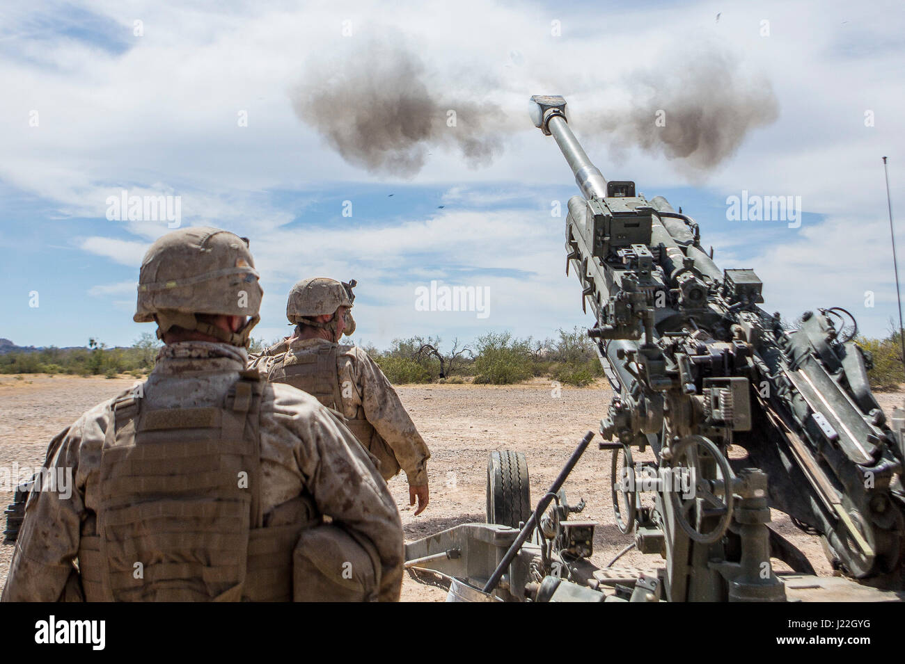 U.S. Marines with Battery B, 1st Batalion, 10th Marine Regiment, fire a M777 towed 155 mm howitzer during assault support tactics 1 (AST-1) in support of Weapons and Tactics Instructor course (WTI) 2-17 at Fire Base Burt, Calif., April 17, 2017. AST-1 is a battalion reinforced air assault exercise, supported by fixed wing and rotary wing aviation fires, aviation delivered artillery, and mortars. WTI is a seven-week training event hosted by Marine Aviation Weapons and Tactics Squadron One (MAWTS-1) cadre, which emphasizes operational integration of the six functions of Marine Corps aviation in  Stock Photo