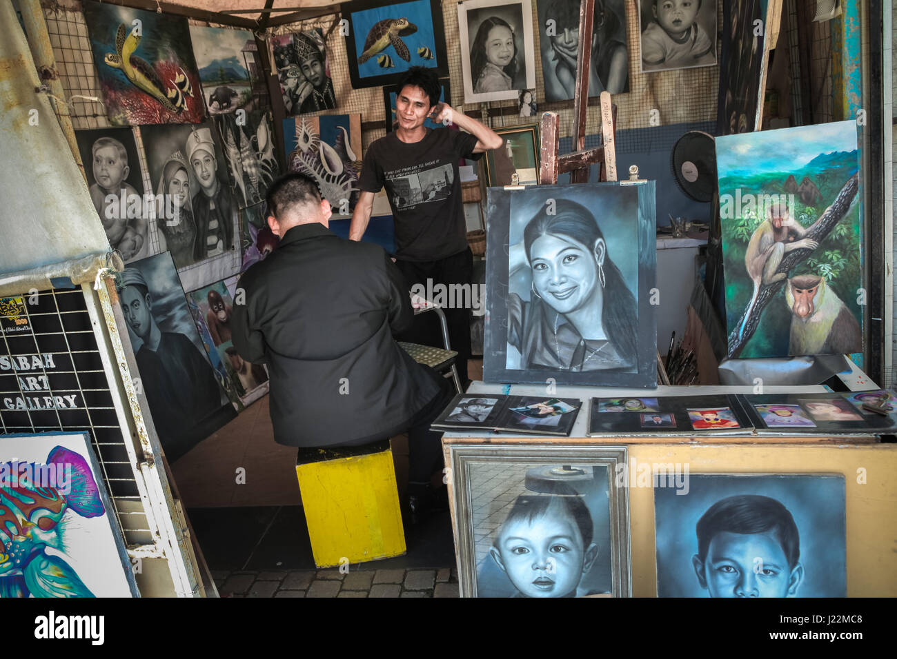 A streetside painting shop at Jesselton Point in Kota Kinabalu, Sabah