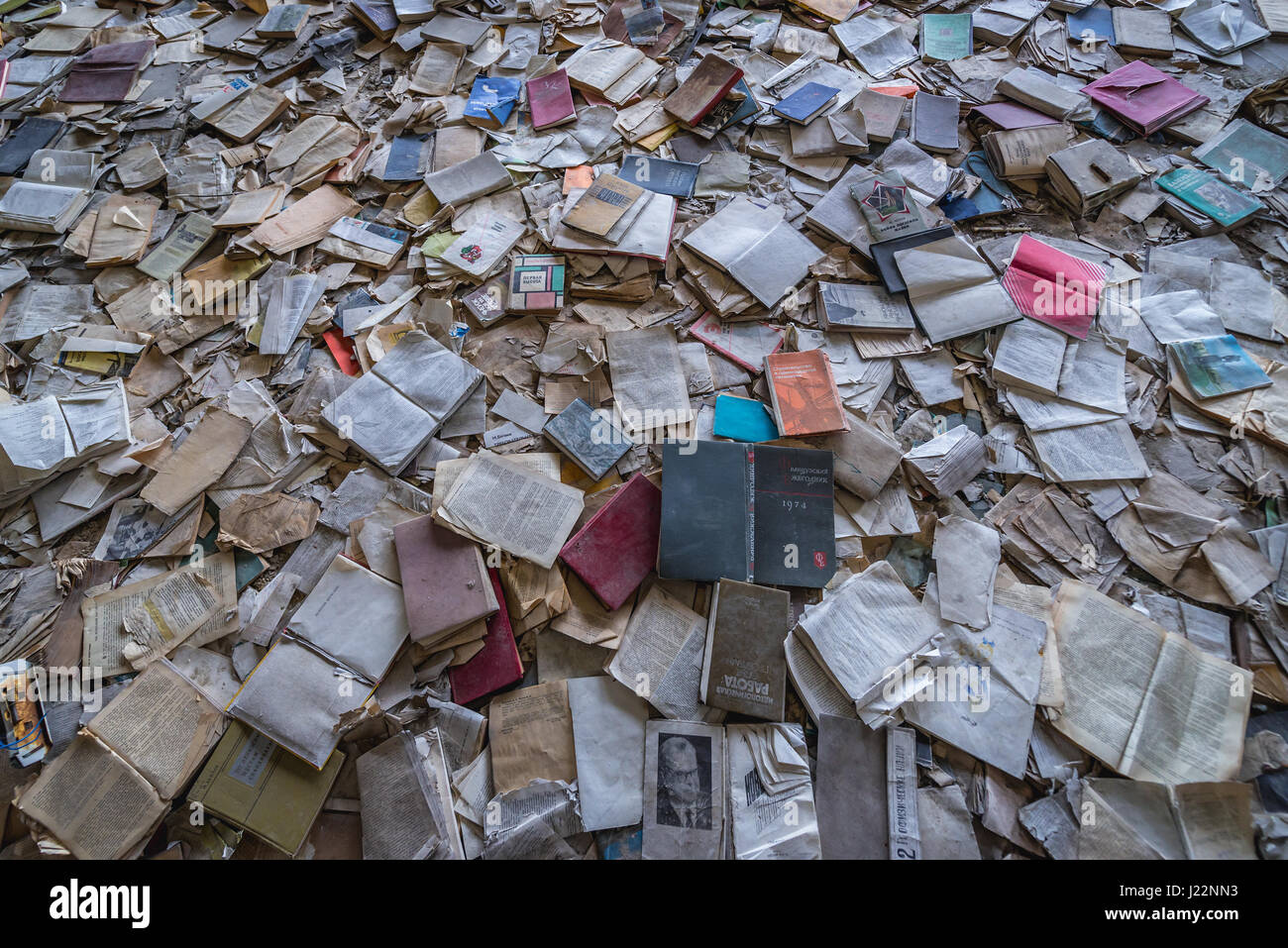 Books on the floor of Palace of Culture Energetik in Pripyat ghost city ...