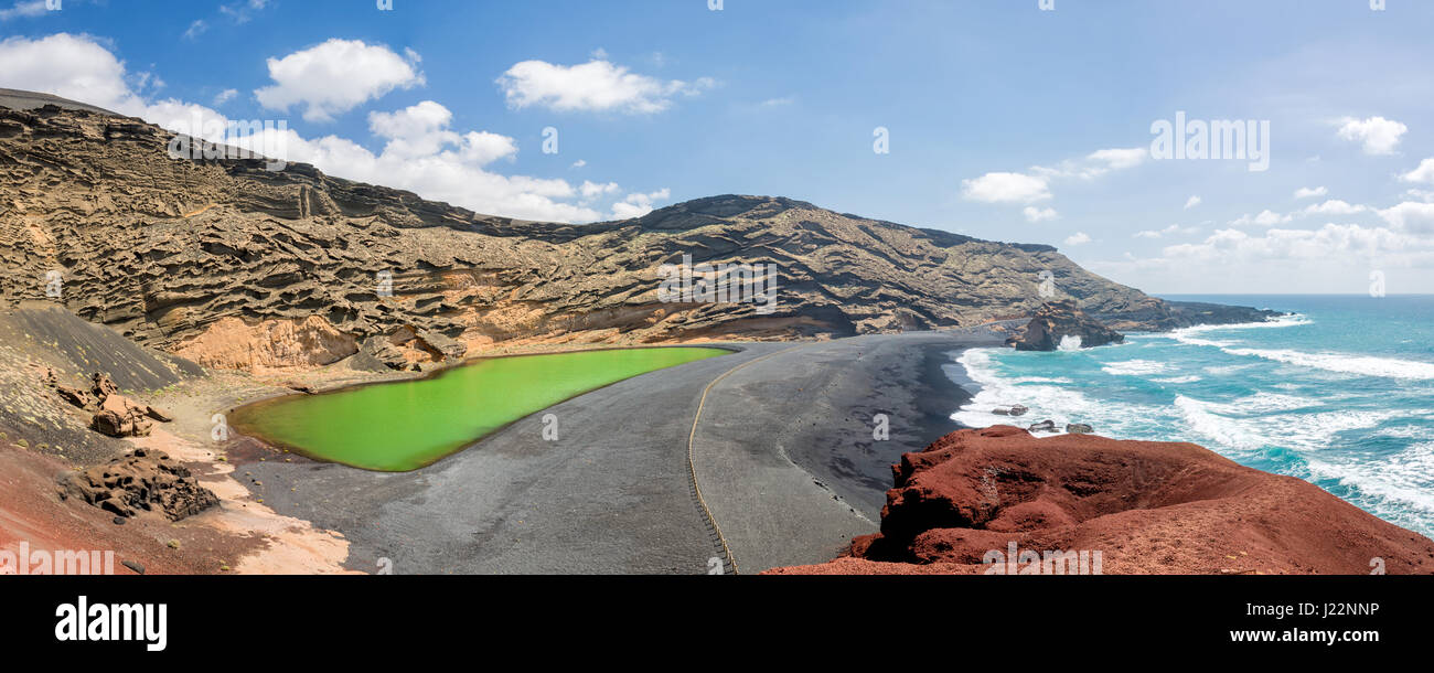 Panorama of Laguna Verde, a green lake near the village of El Golfo in Lanzarote, Canary islands, Spain Stock Photo