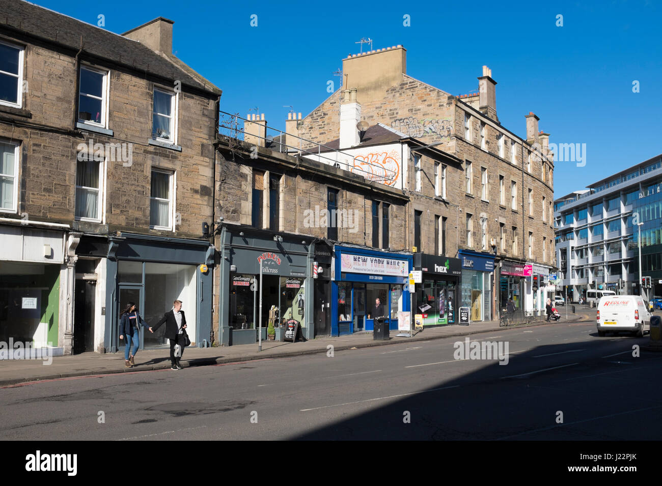Shops and tenements at Tollcross, Edinburgh. Stock Photo