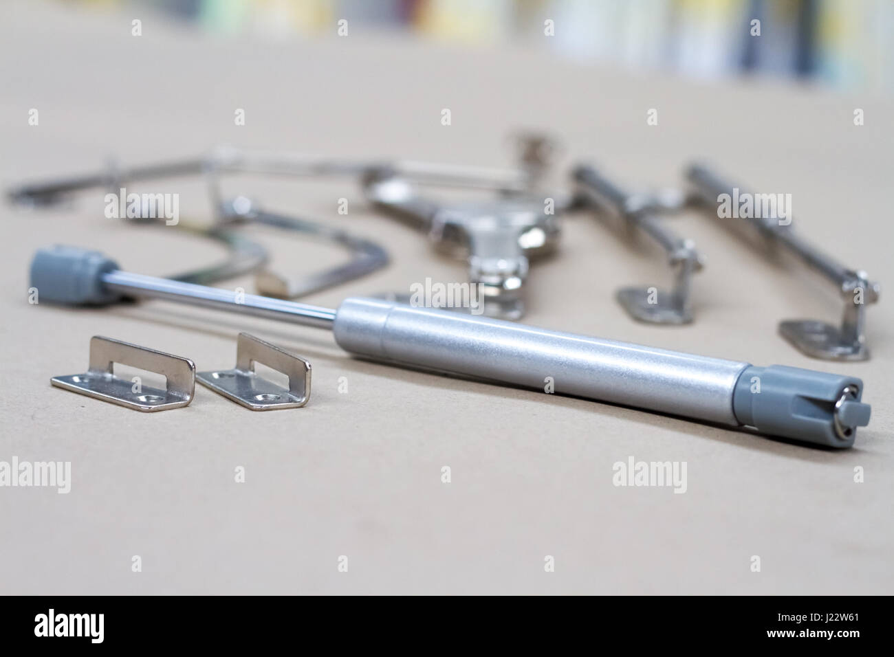 Fasteners for shelf display.Fittings for furniture. Closers, fasteners