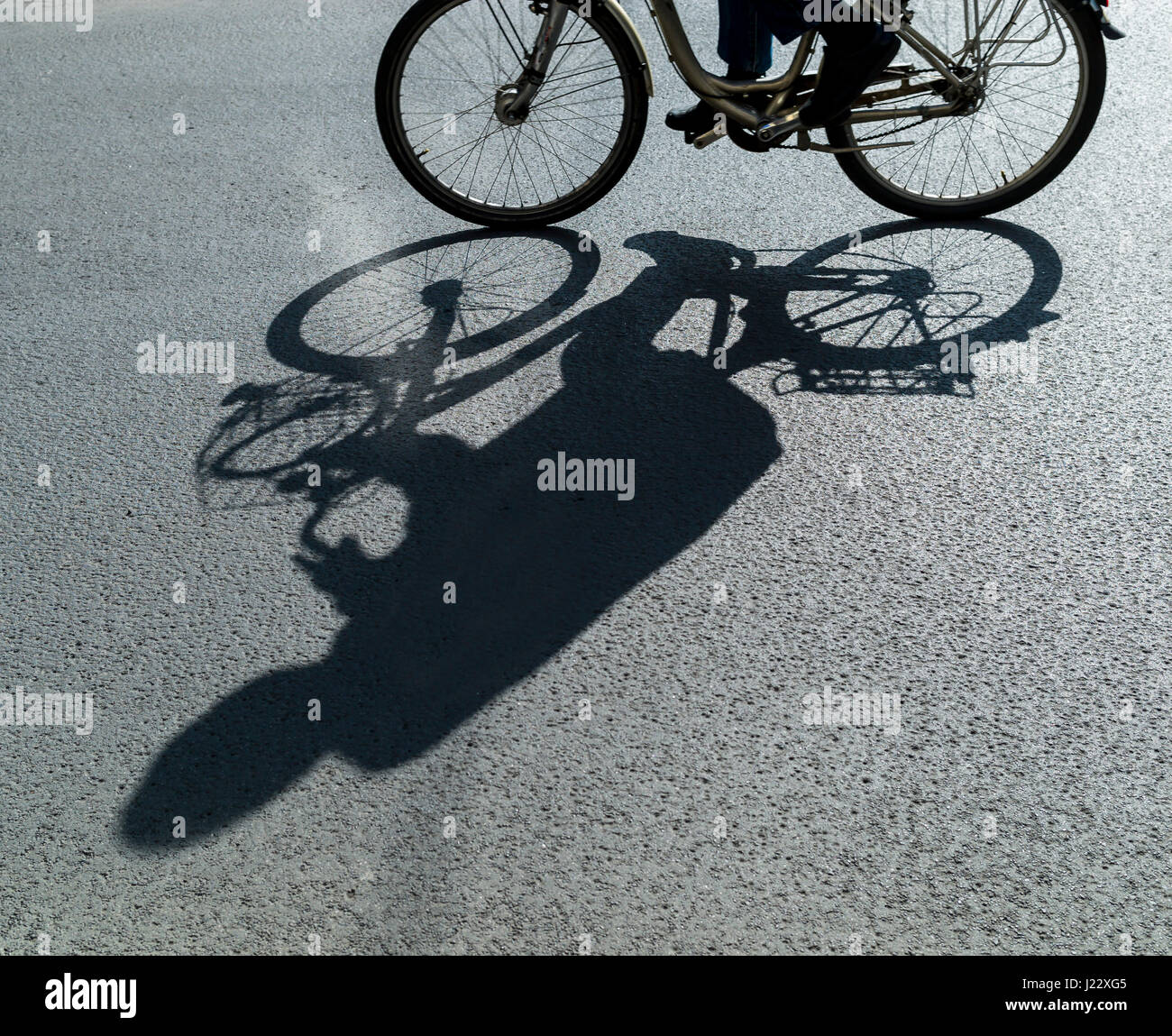 Shadow of a cyclist Stock Photo