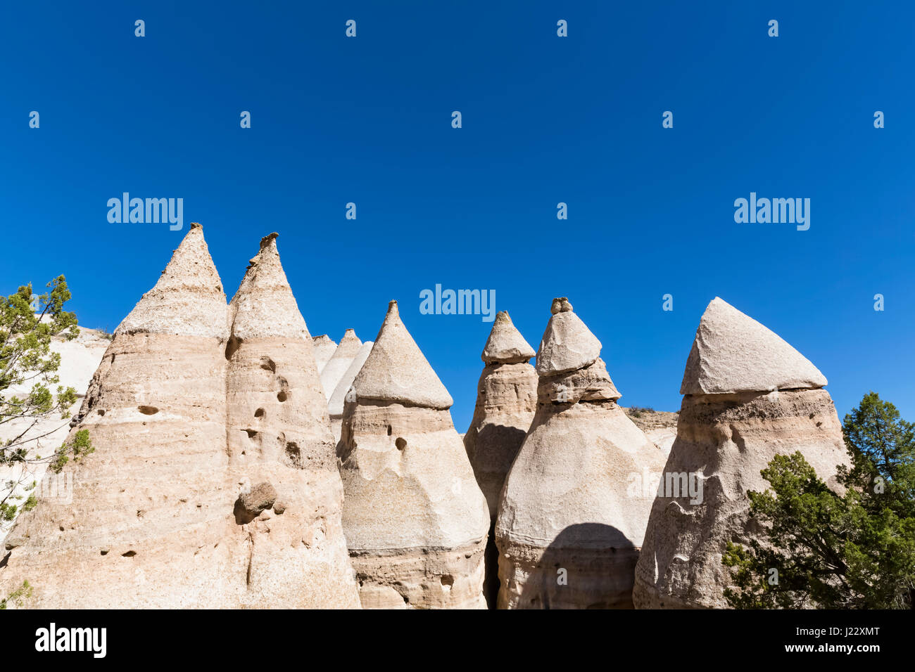 USA, New Mexico, Pajarito Plateau, Sandoval County, Kasha-Katuwe Tent Rocks National Monument, desert valley with bizarre rock formations Stock Photo