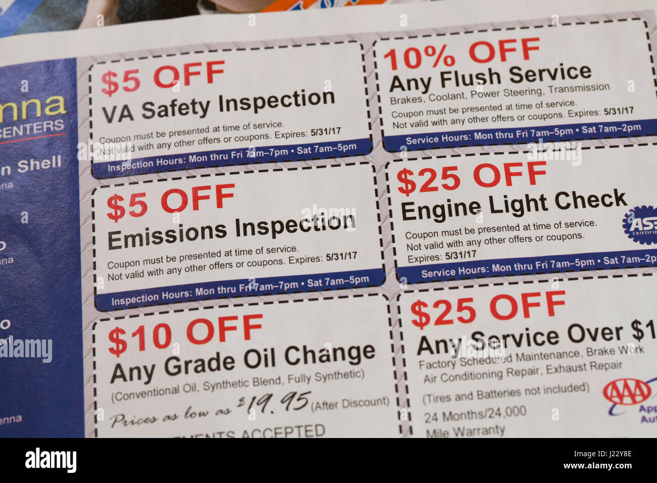 Auto maintenance and repair coupons in weekly mailer ad - USA Stock Photo