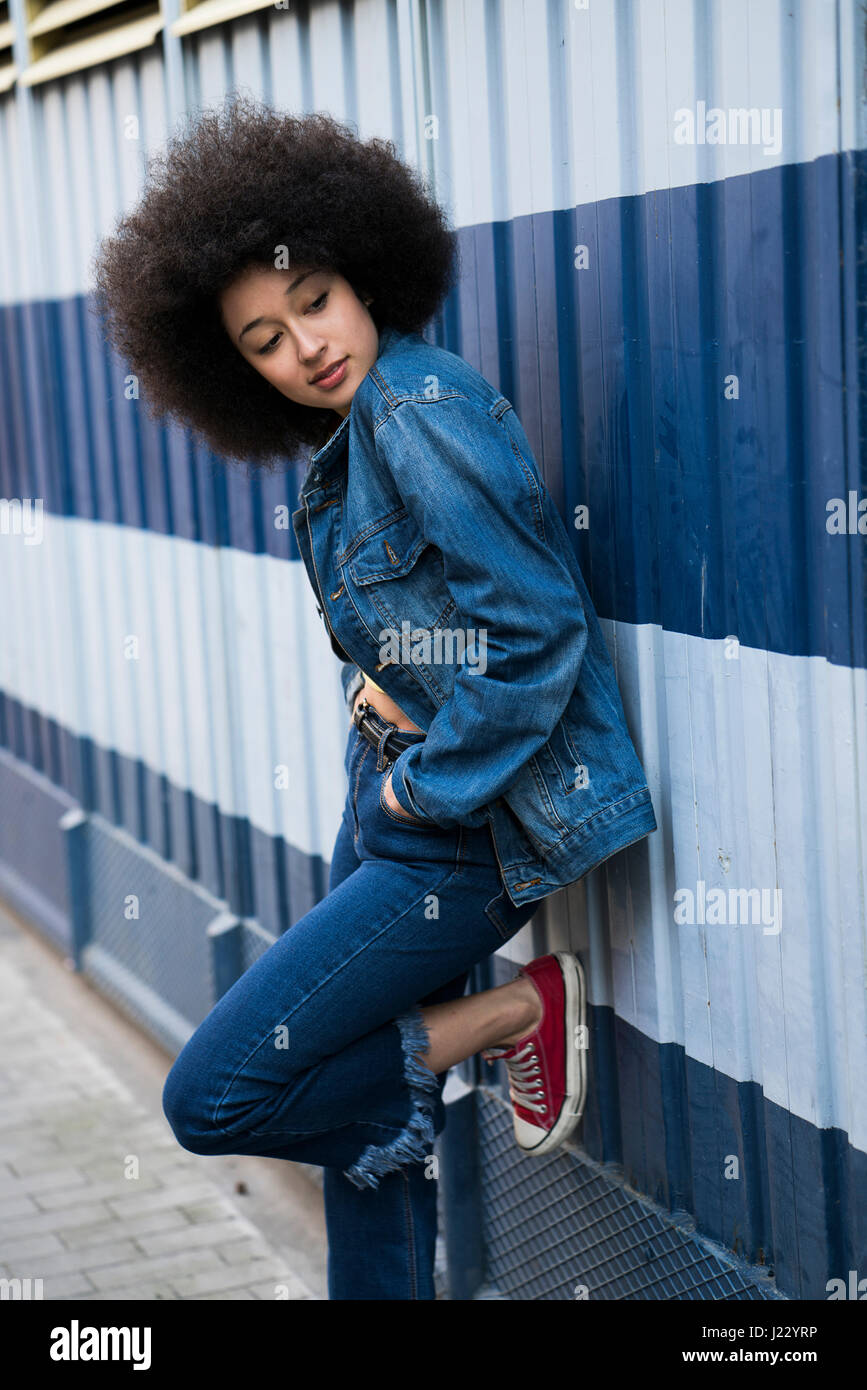 Portrait of young woman watching something Stock Photo