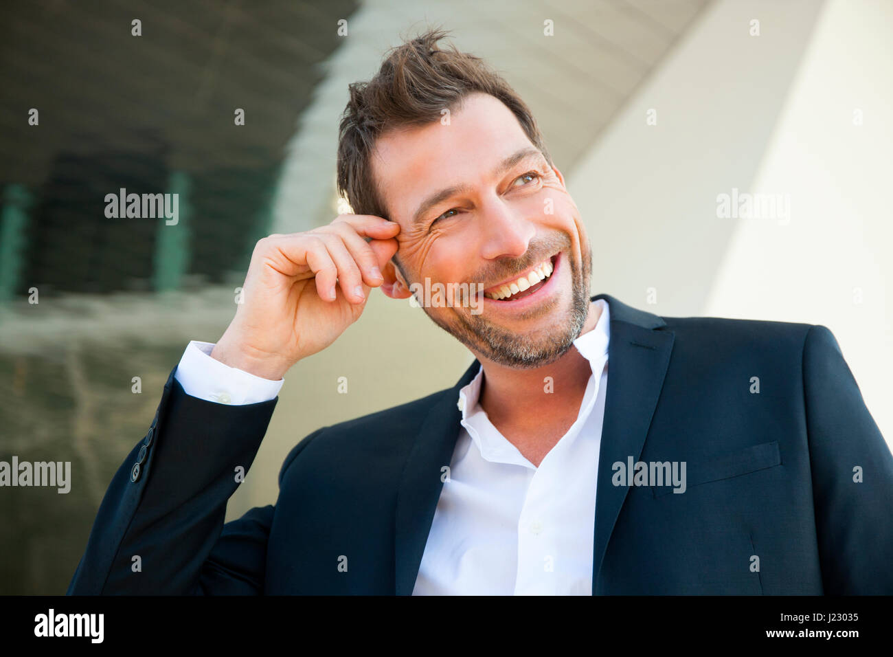 Portrait of confident businessman outdoors Stock Photo - Alamy