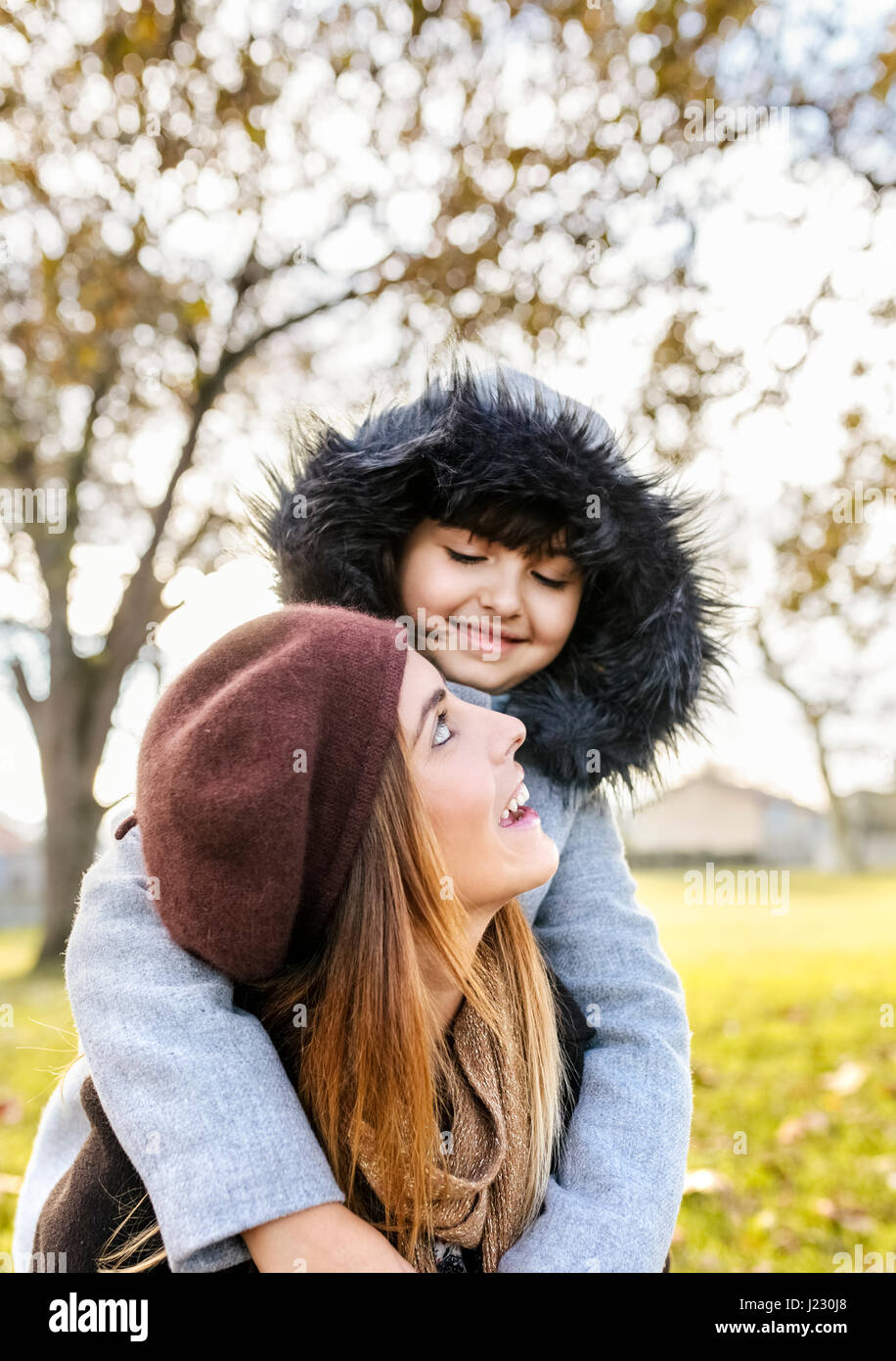 Mother with her little daughter in autumnal park Stock Photo - Alamy