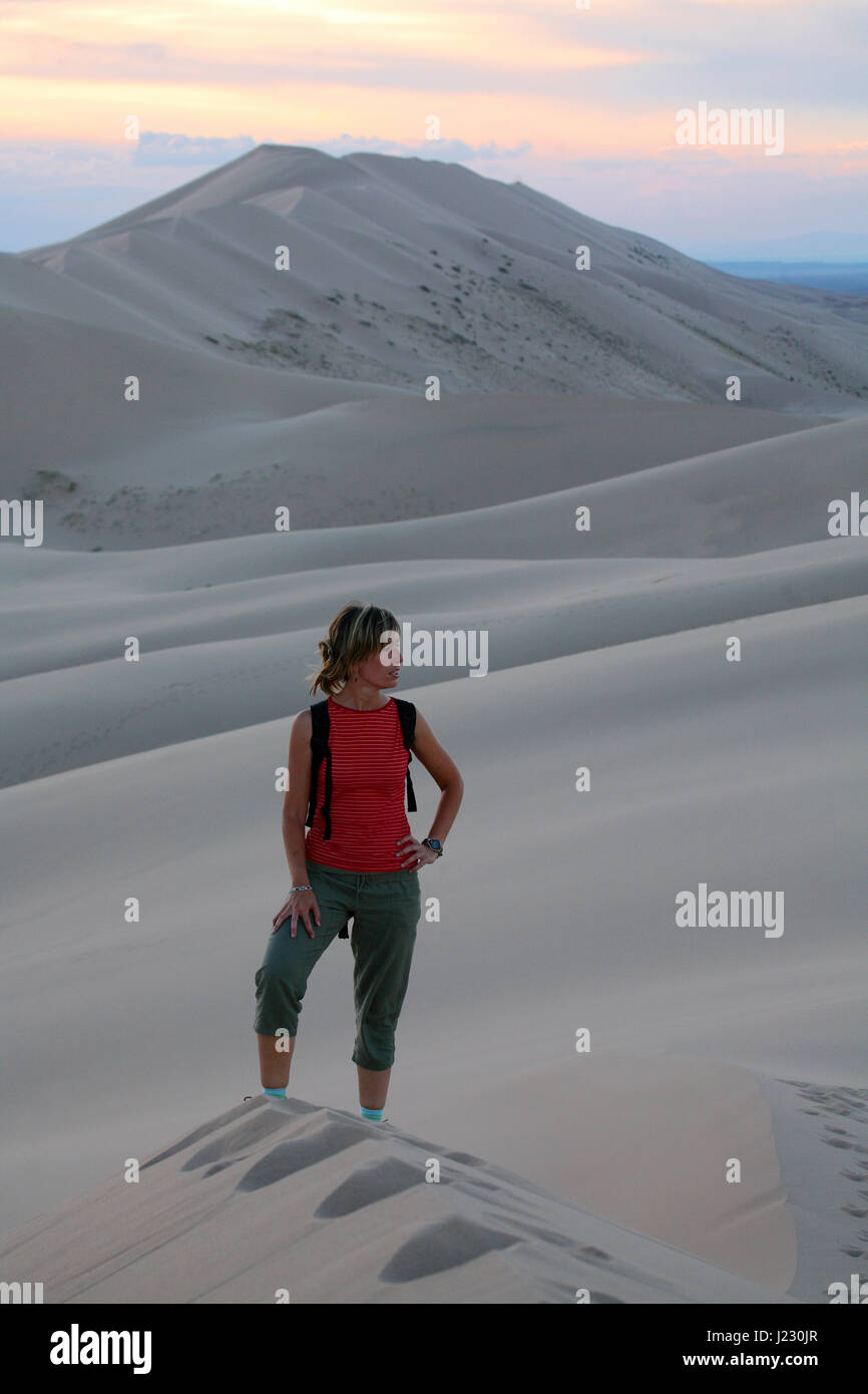 Climbing Dunes in the Namib-Naukluft National Park. These are the oldest and highest sand dunes in the world Stock Photo