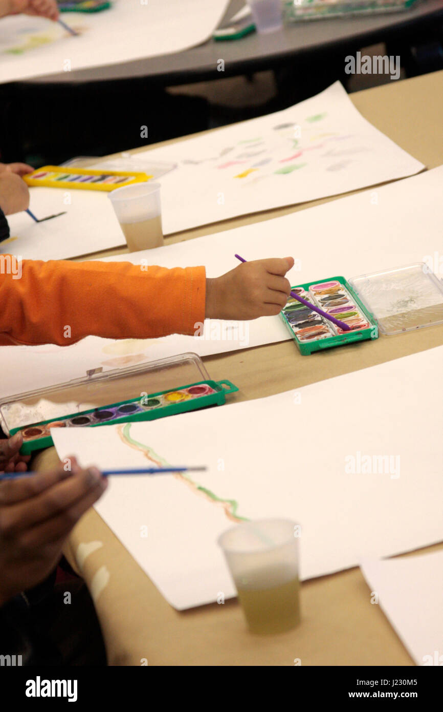 Children Painting with Water Colors Stock Photo - Alamy