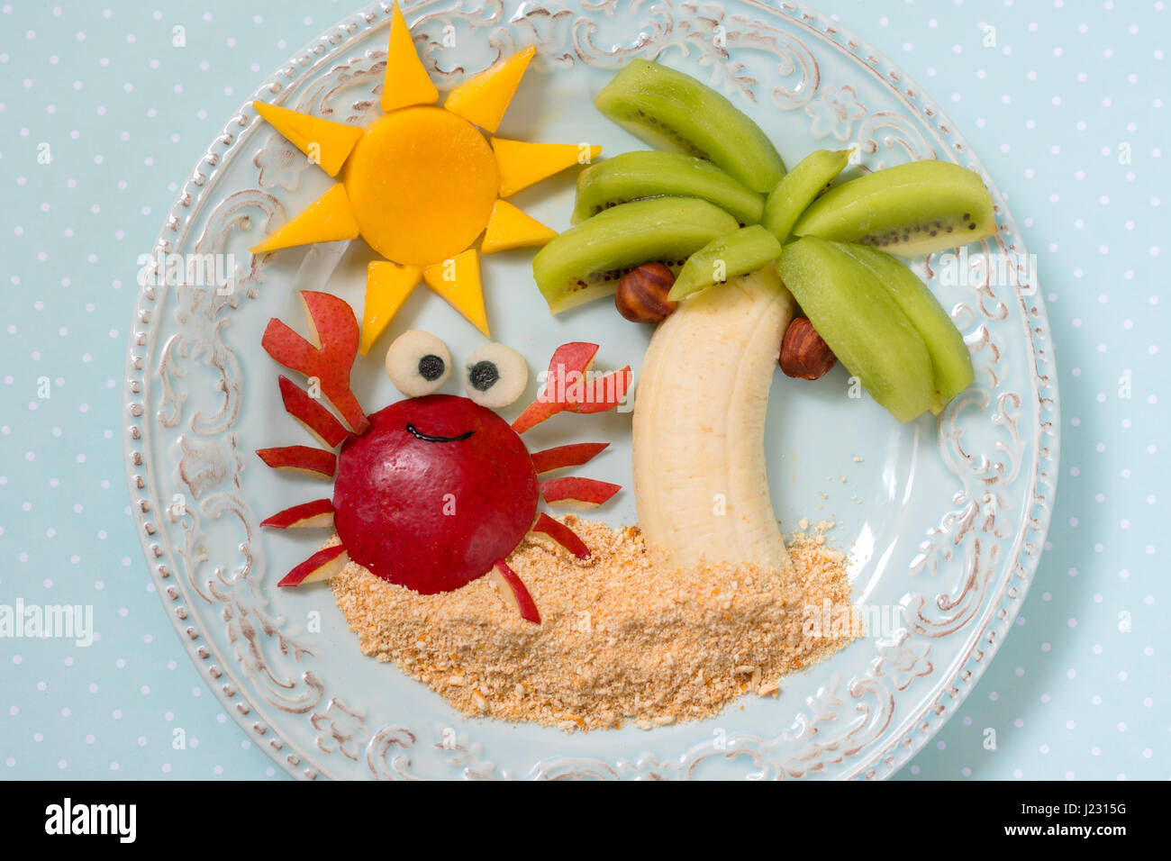 Fruit dessert for kid child with kiwi, banana and pear Stock Photo Alamy