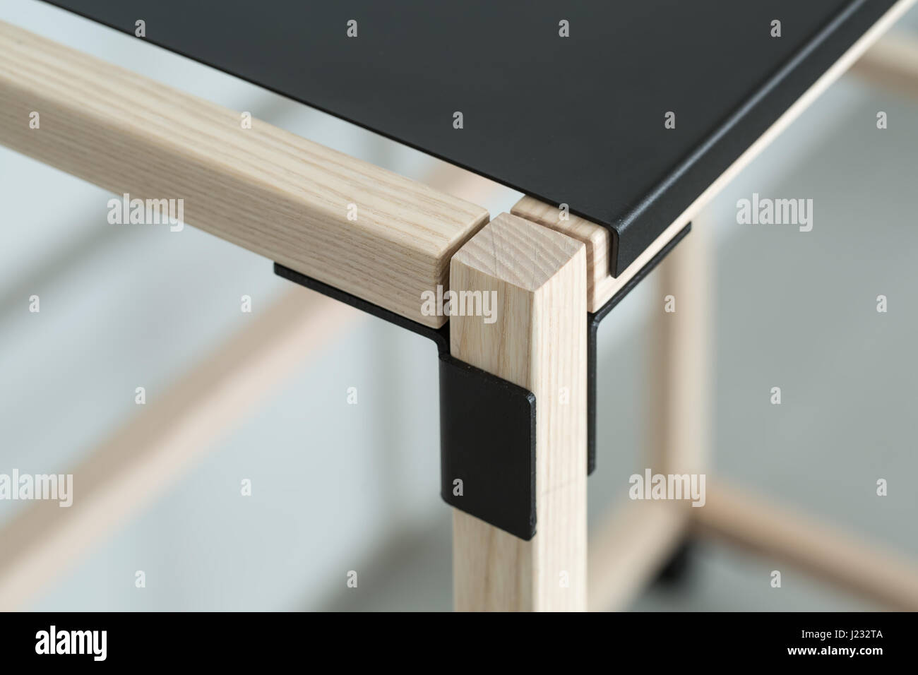 Wooden construct with metal parts Stock Photo