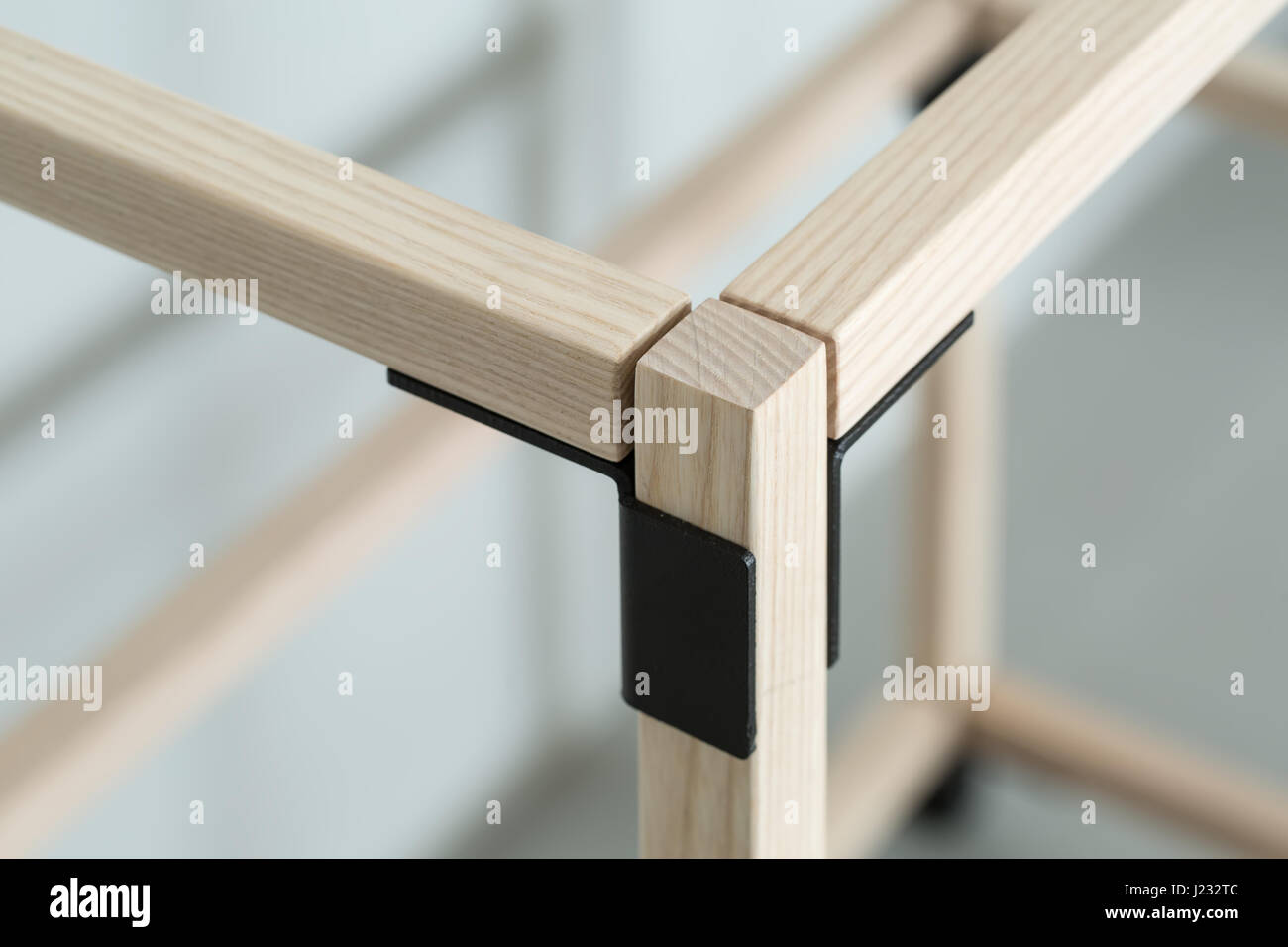 Wooden construct with metal parts Stock Photo