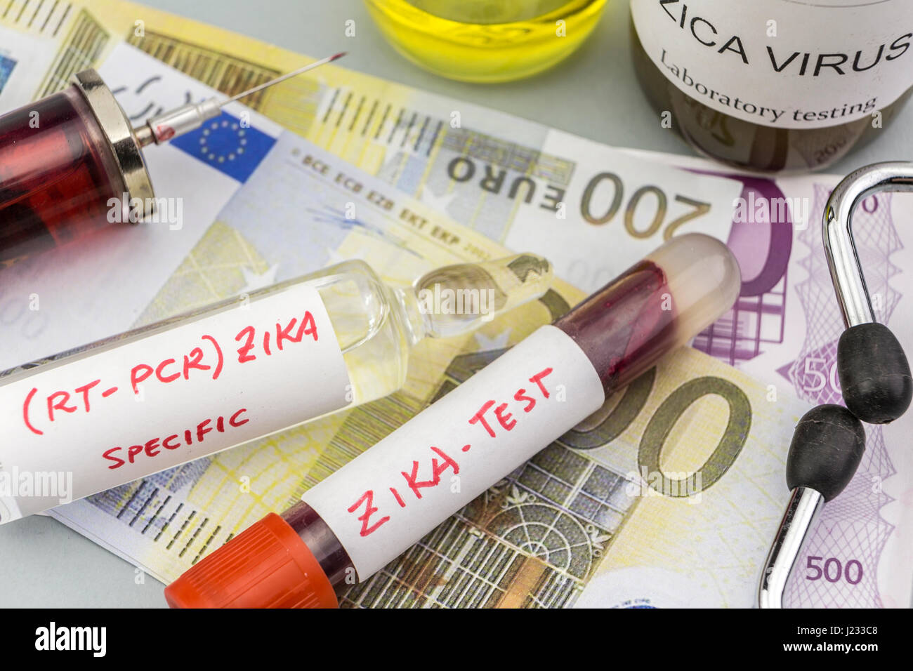 Tests for Research of ZIKA test and vials on tickets of euro, concept of pharmaceutical copayment Stock Photo