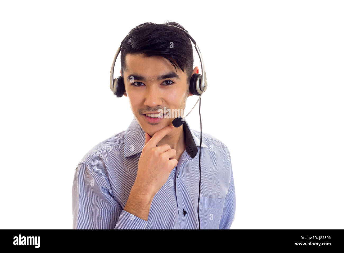 Young man using headphones  Stock Photo