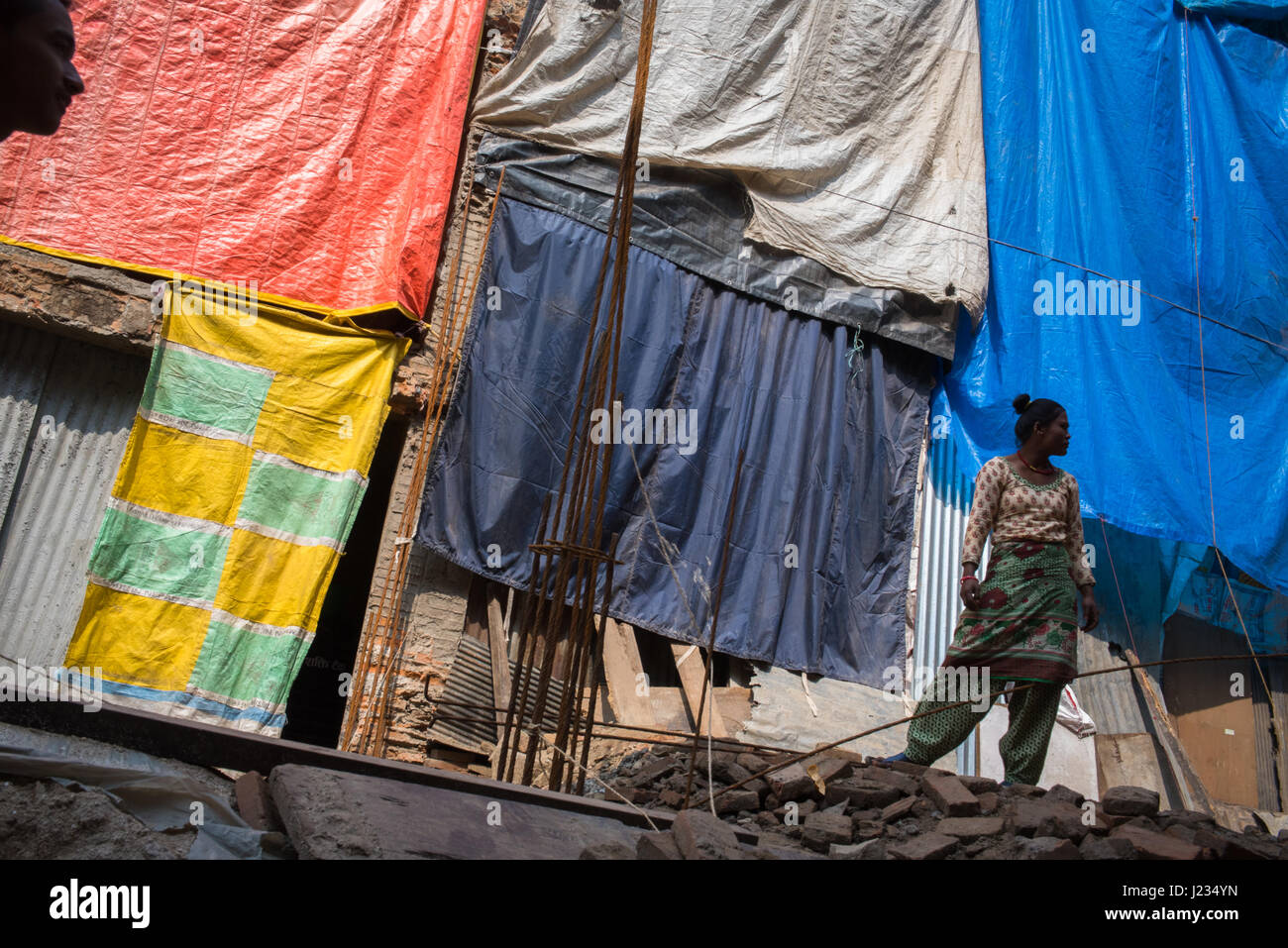 Female laborer at a reconstruction site in Bhaktapur, Nepal. Stock Photo