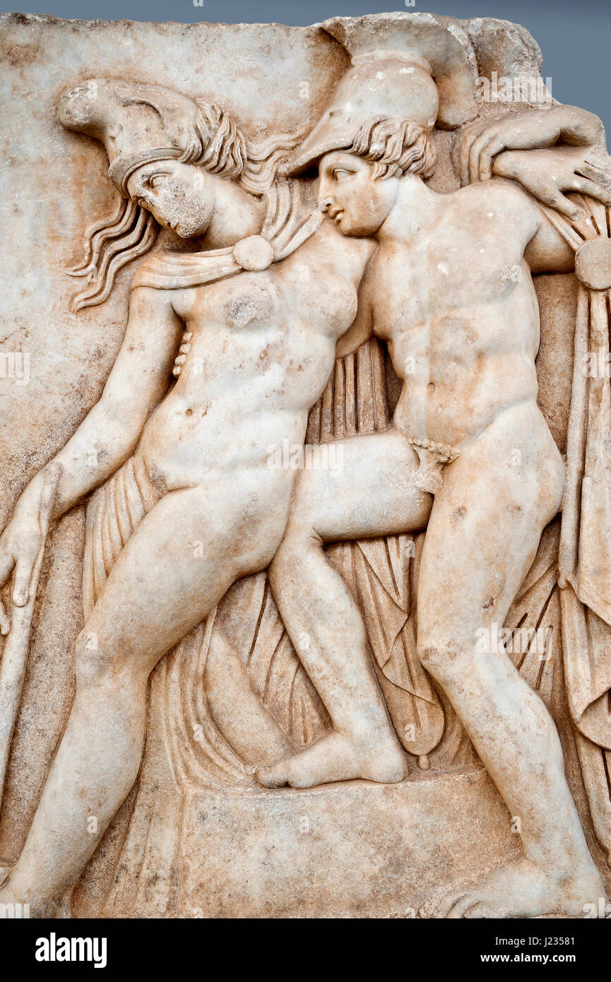 Roman temple freize relief sculpture of Achilles and a dying Amazon, Aphrodisias Museum, Aphrodisias, Turkey.   Achilles supports the dying Amazon que Stock Photo