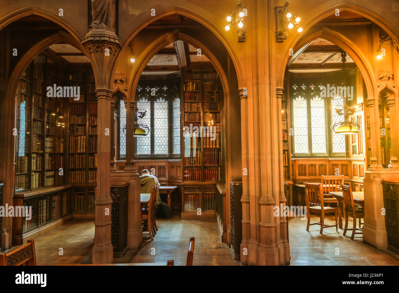 Reading room of the John Rylands Library in Manchester, UK. Historical interiors of the library. Stock Photo