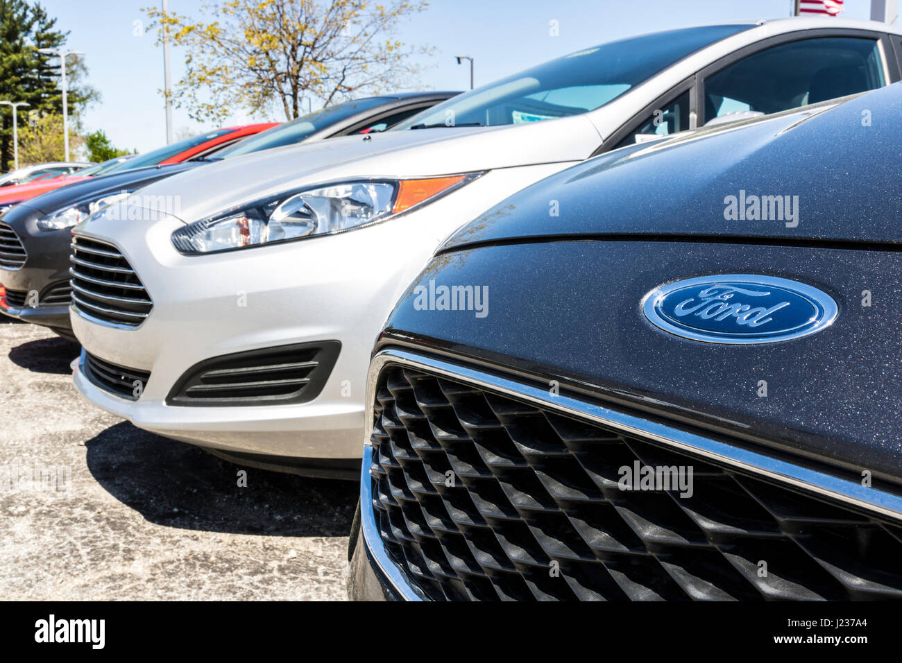 Indianapolis Circa April 2017 A Local Ford Car and Truck Dealership. Ford sells products